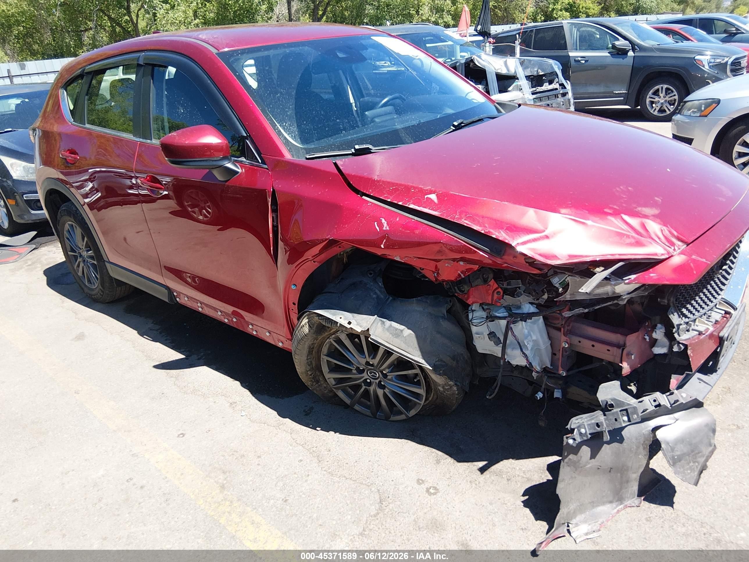 2019 Mazda CX-5 Sport, VIN JM3KFBBM6K0638721 — Side
