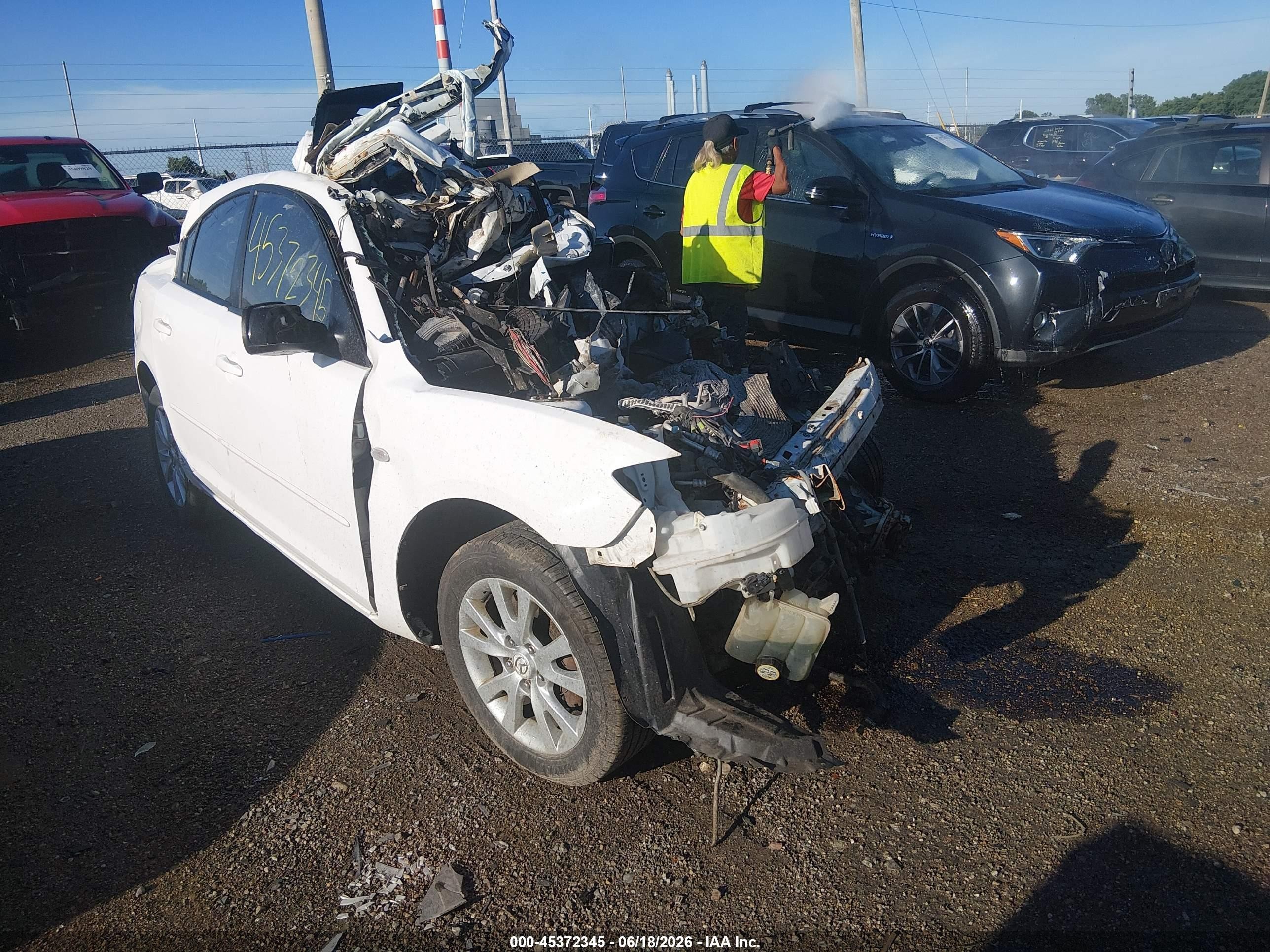 2007 Mazda 3 i Touring, VIN JM1BK32F471688370 — Rollover
