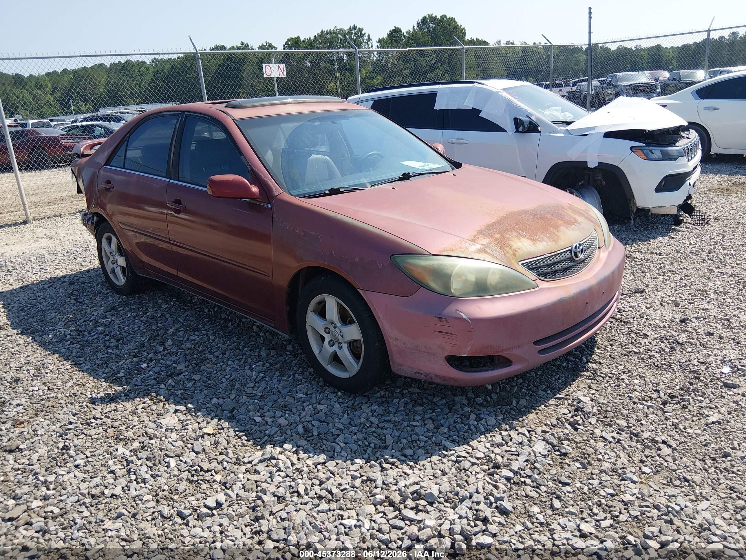 2002 Toyota Camry SE, VIN 4T1BF32K12U011541 — Normal wear