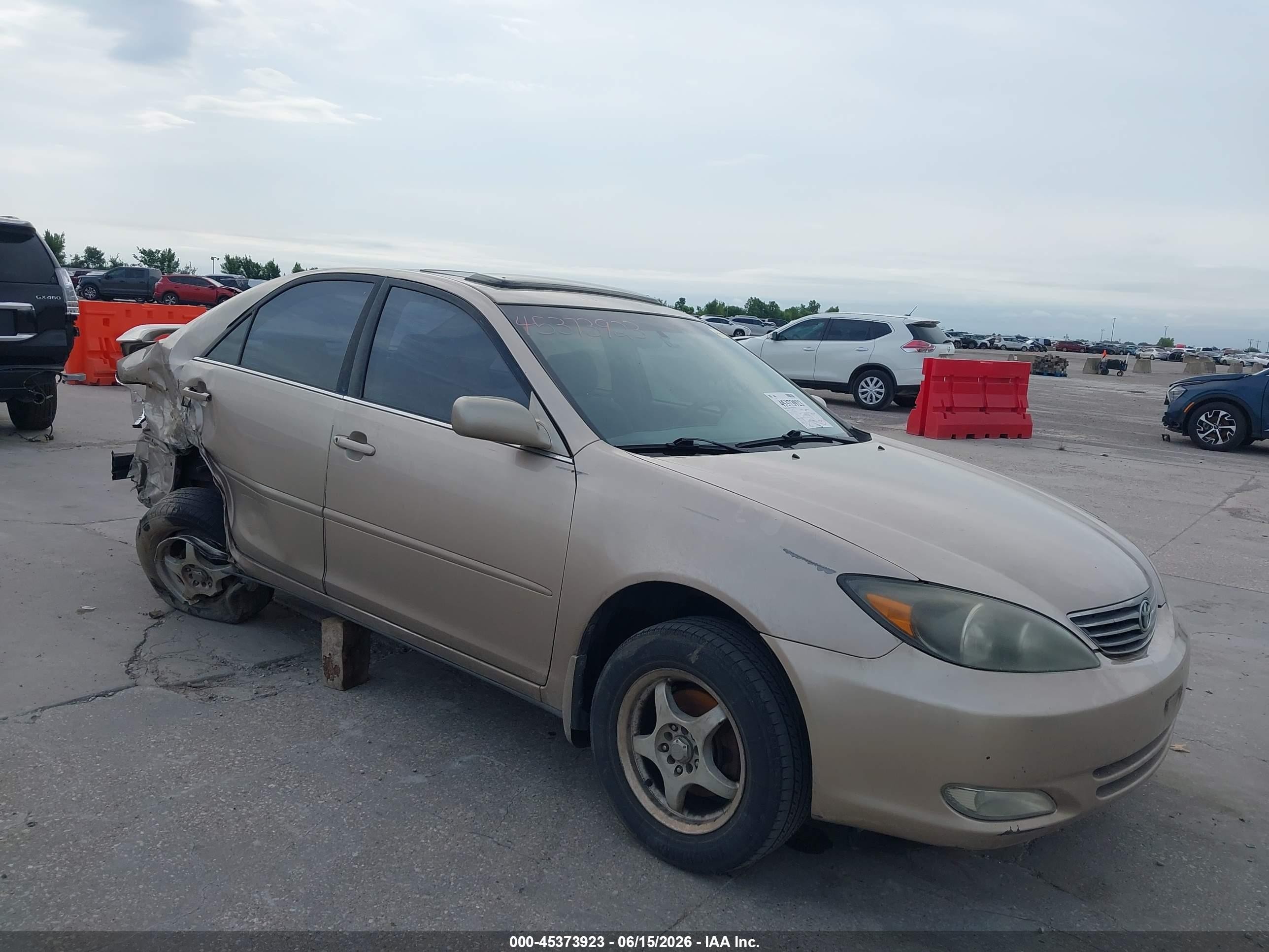 2003 Toyota Camry LE, VIN 4T1BE32K03U657559 — Side