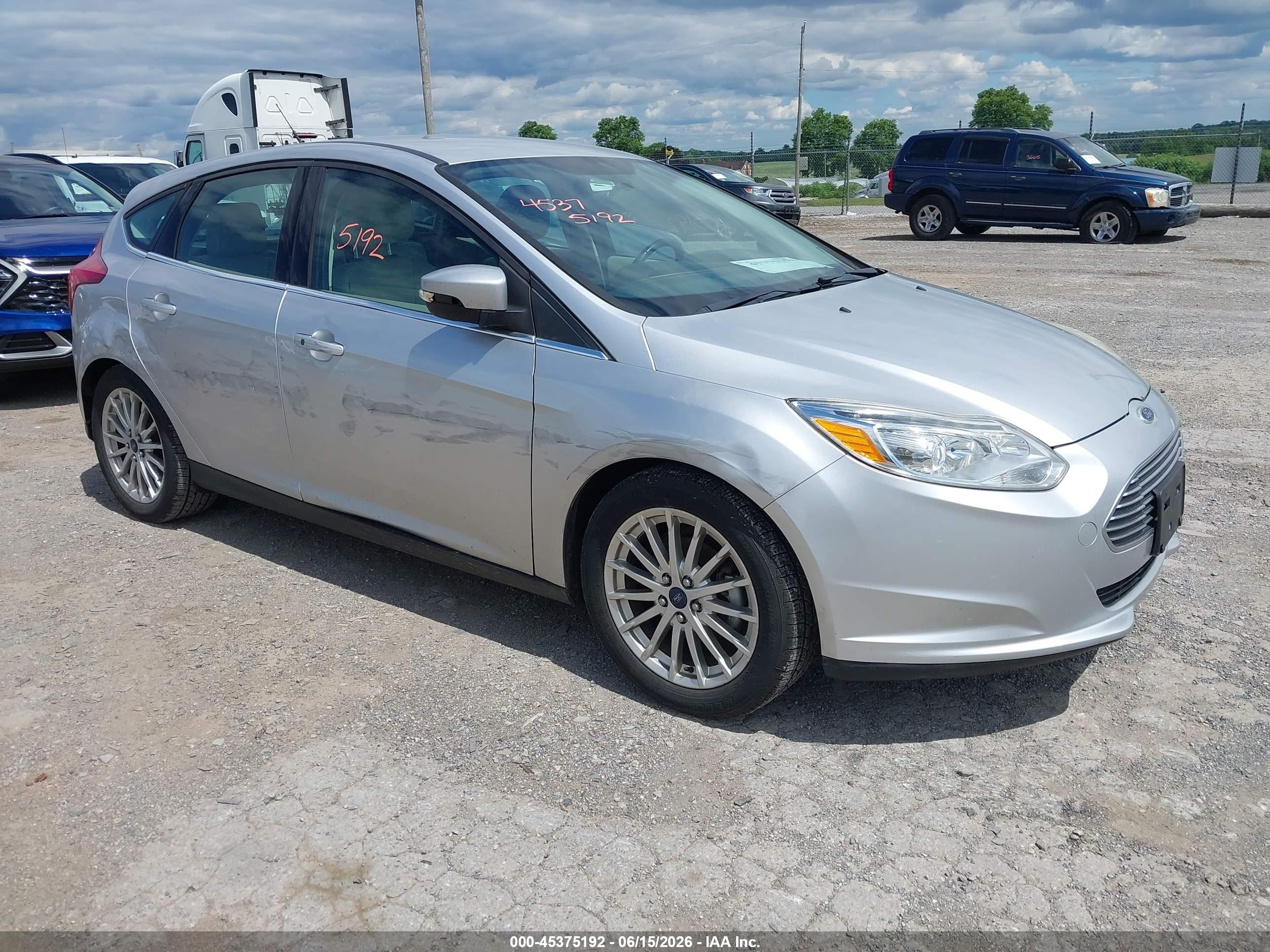 2013 Ford Focus Electric, VIN 1FADP3R4XDL146727 — Side