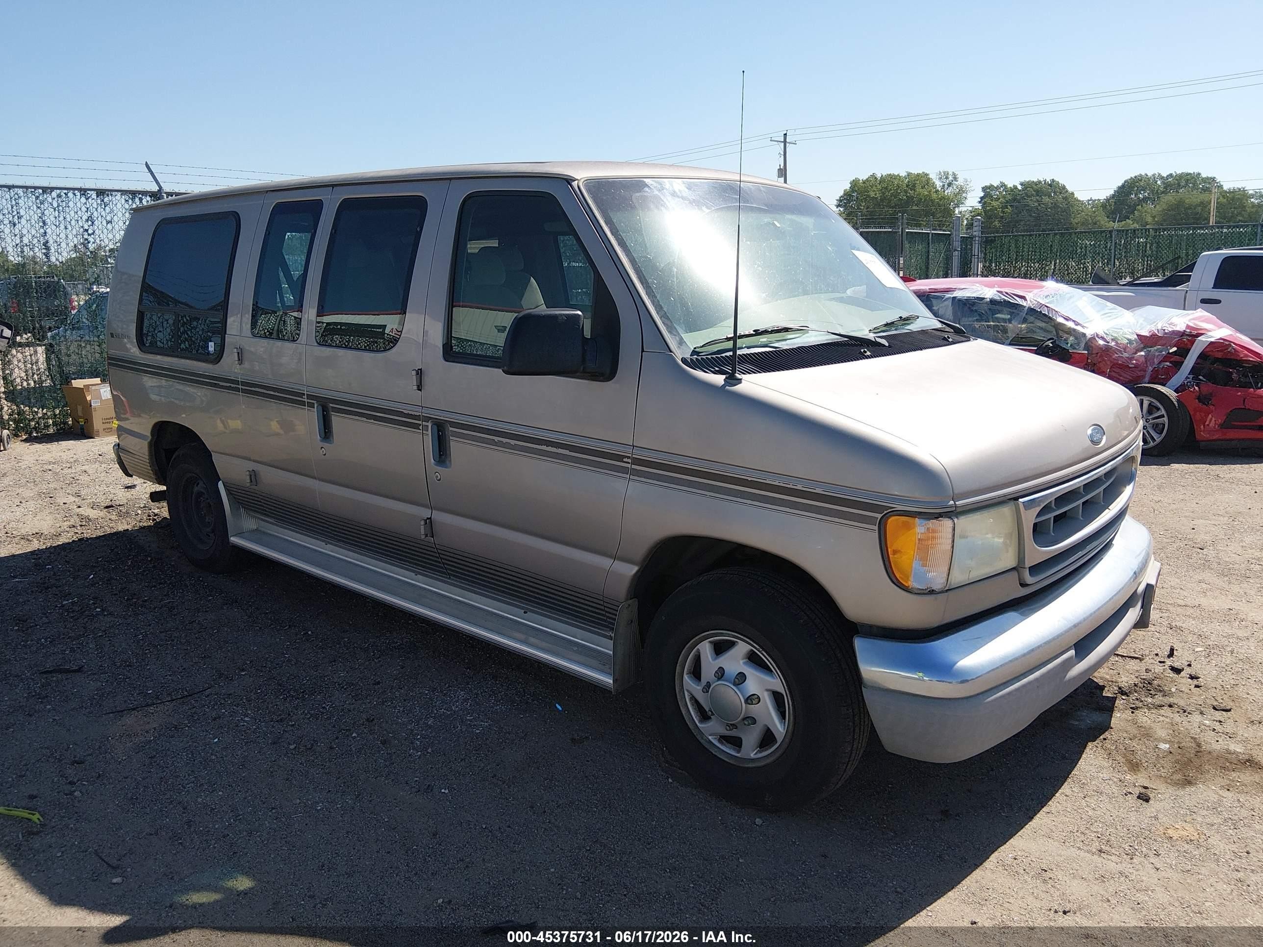 2002 Ford E-150, VIN 1FDRE14252HA93513 — Hail