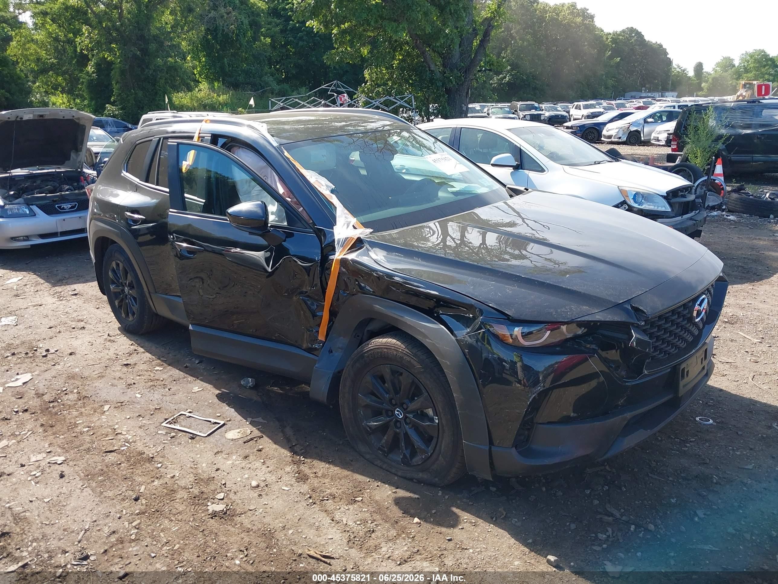 2025 Mazda CX-50 S Premium, VIN 7MMVABDMXSN370471 — Бок