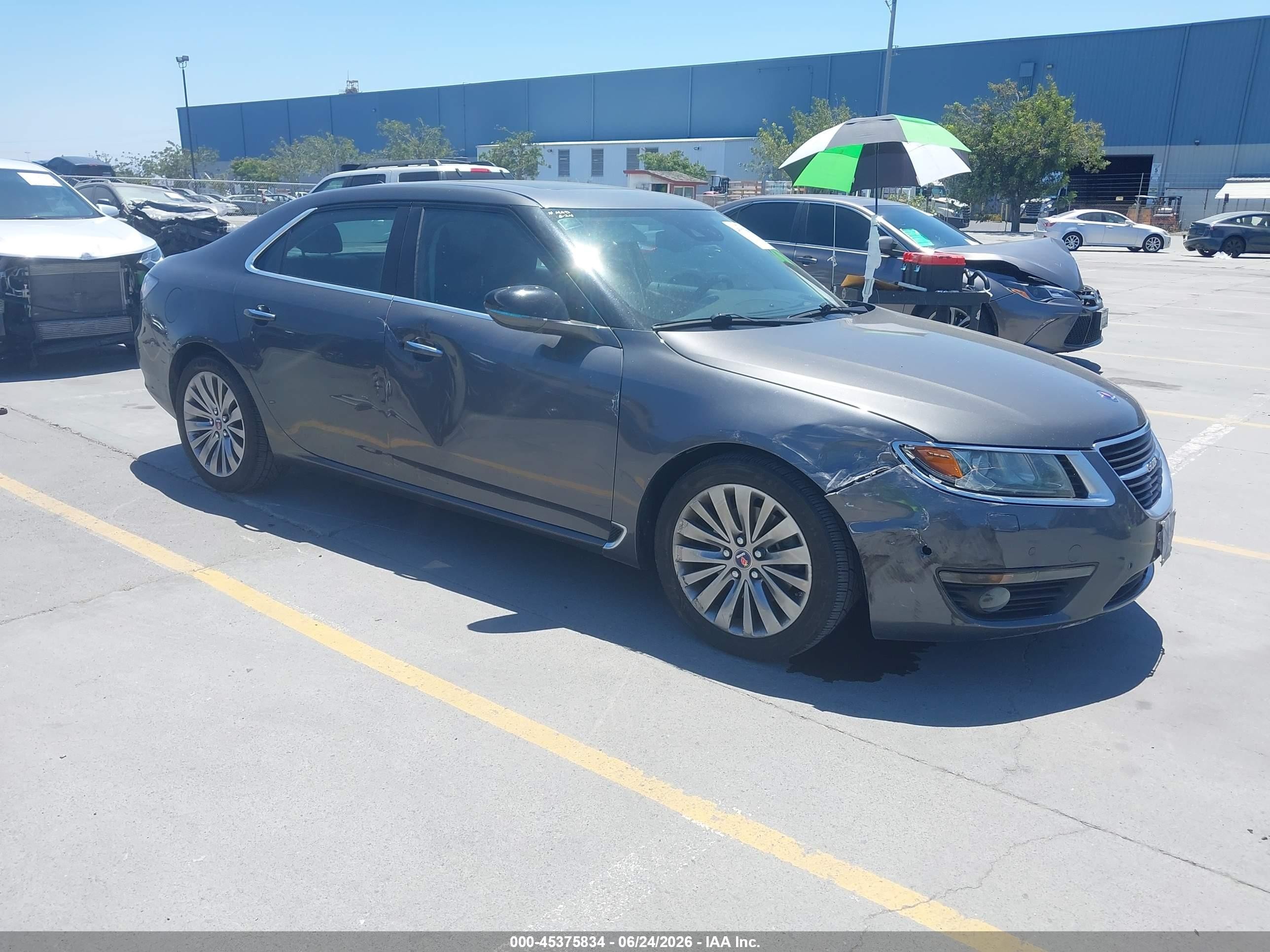 2011 Saab 9-5 Turbo4, VIN YS3GN4AR9B4002273 — Side