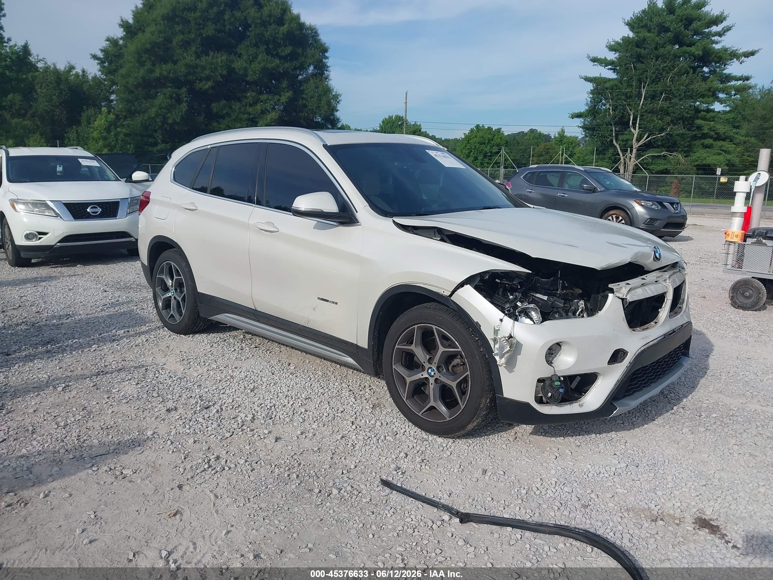 2018 BMW X1 sDrive28i, VIN WBXHU7C32J5H40701 — Front end