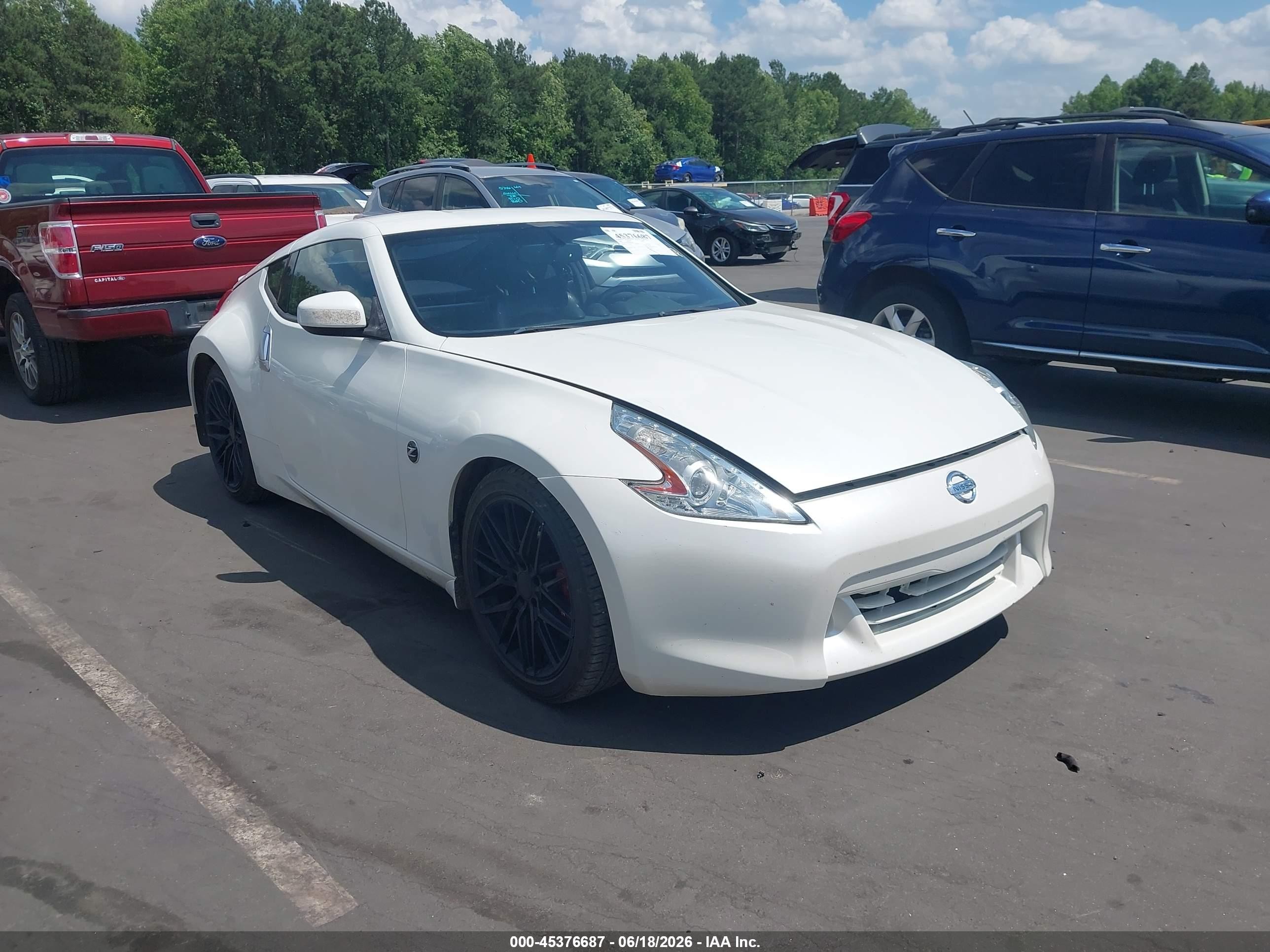 2009 Nissan 370Z Touring, VIN JN1AZ44E49M403009 — Side