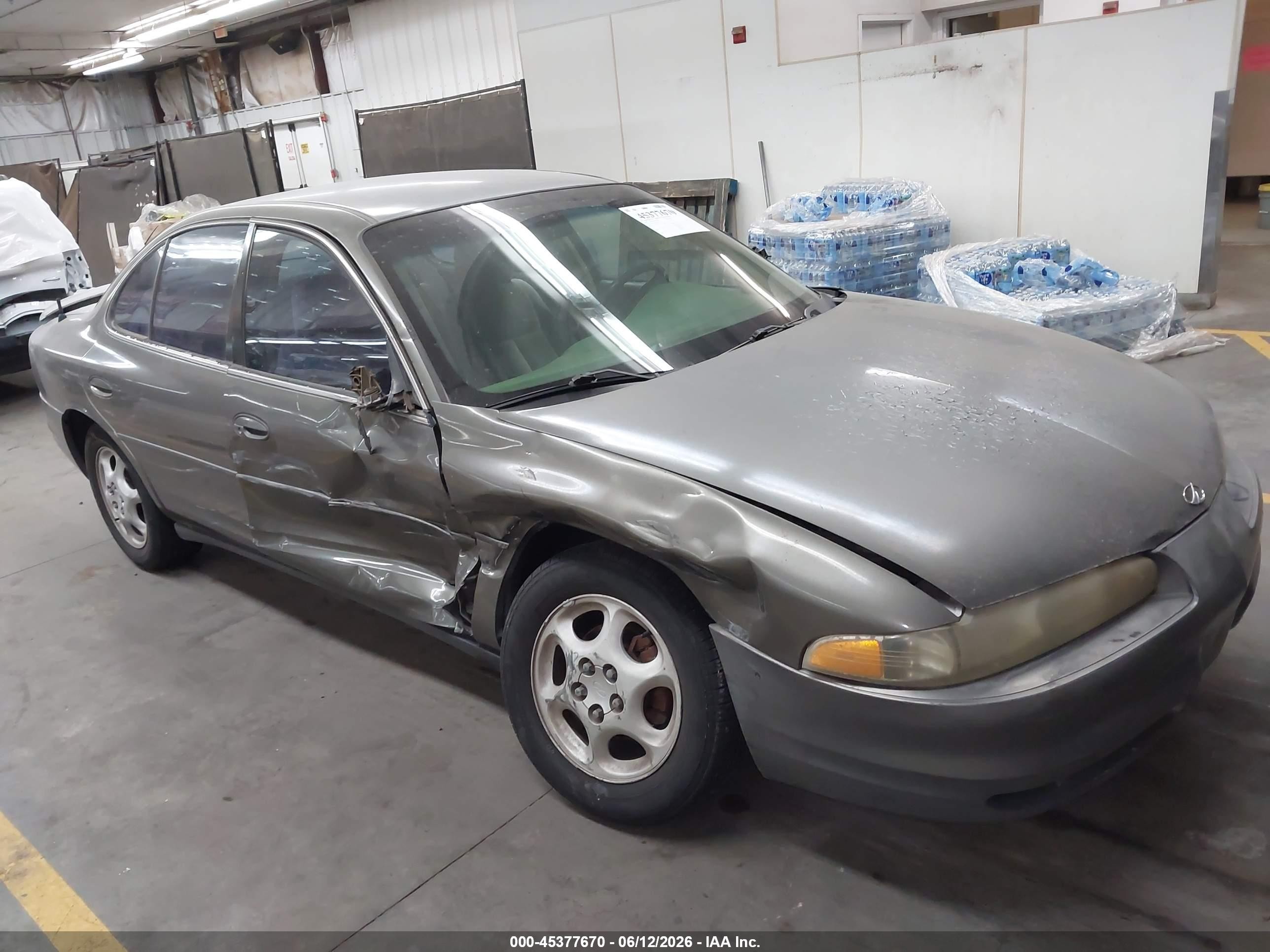 1998 Oldsmobile Intrigue GX, VIN 1G3WH52K9WF362381 — Side