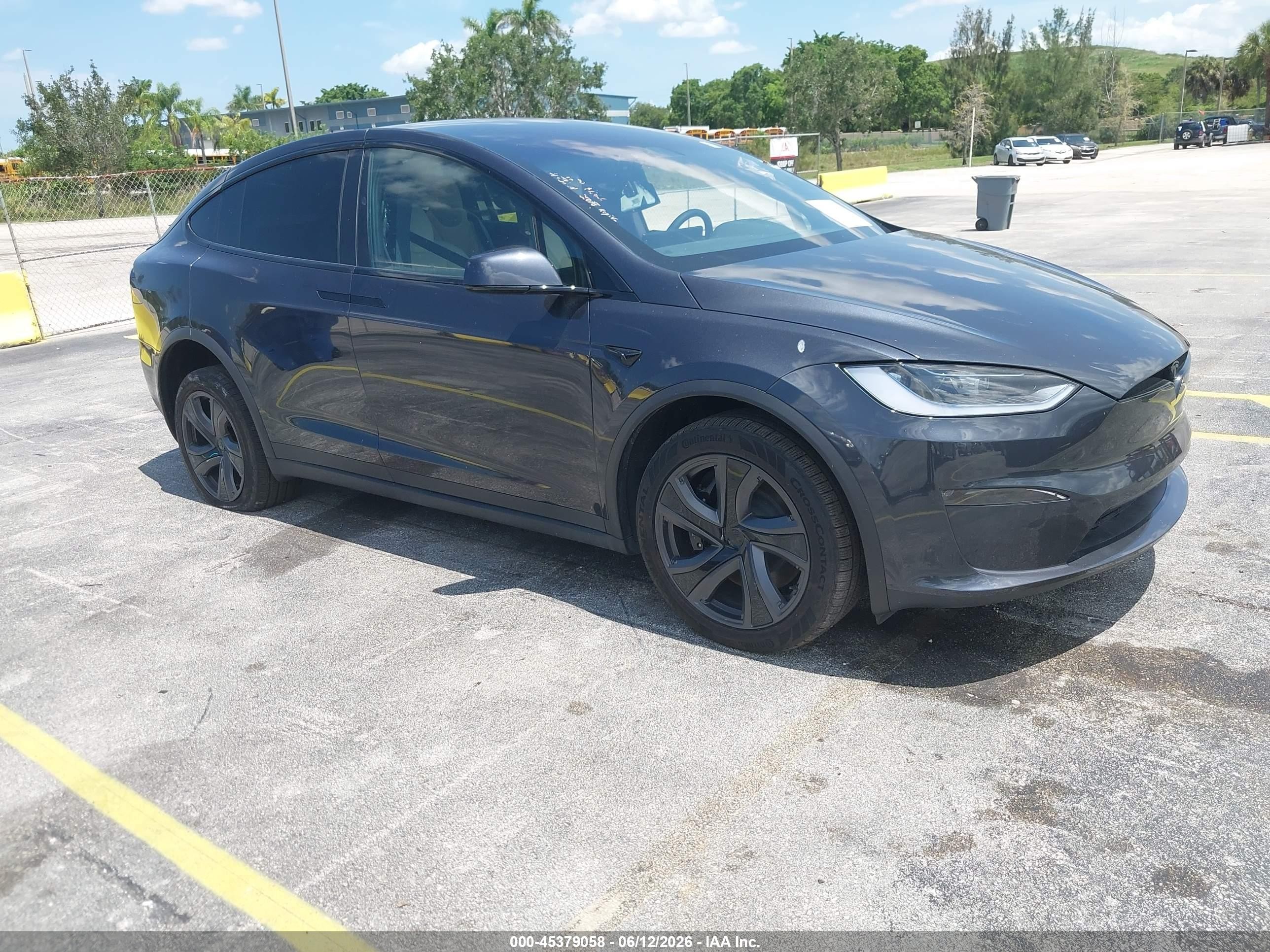 2026 Tesla Model X, VIN 7SAXCBE51TF473212 — Vandalism