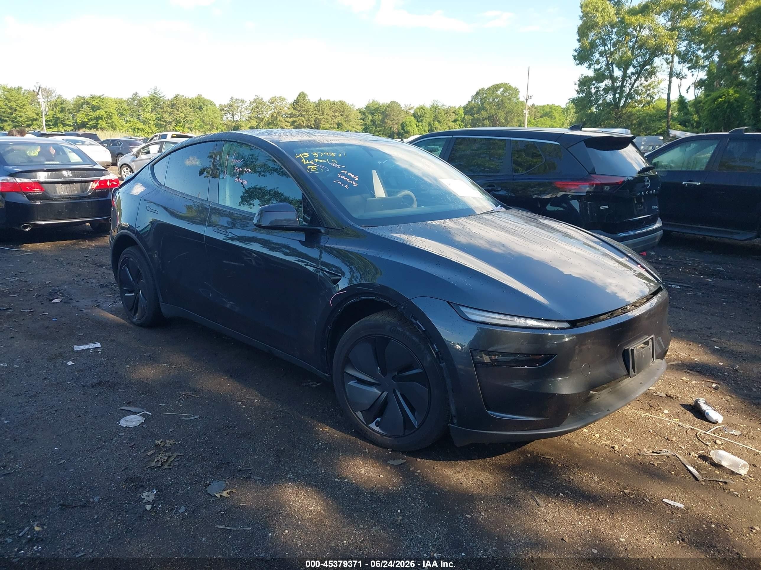 2026 Tesla Model Y Long Range, VIN 7SAYGDED0TF434123 — Side