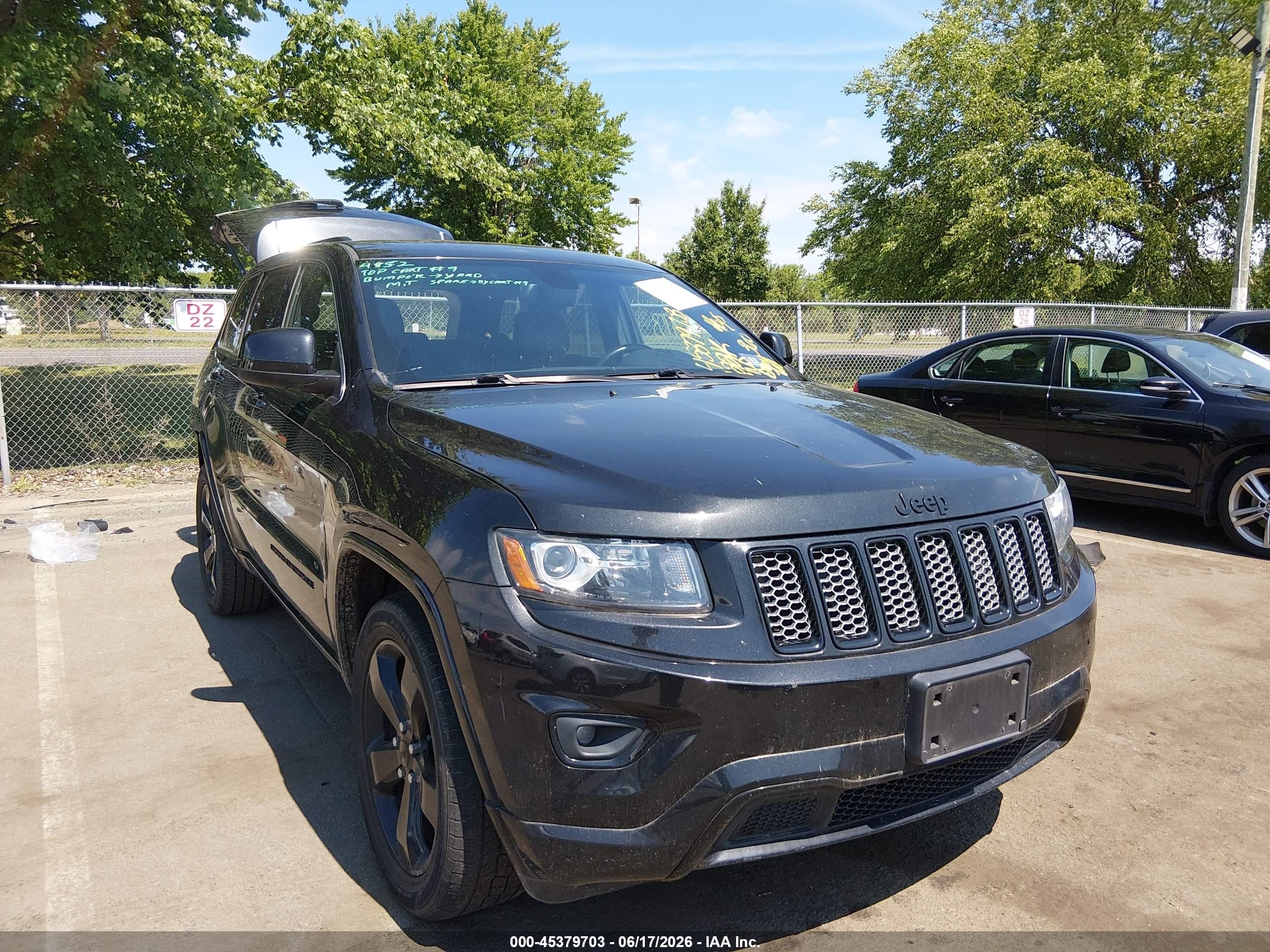 2015 Jeep Grand Cherokee Altitude, VIN 1C4RJFAG7FC758587 — Зад