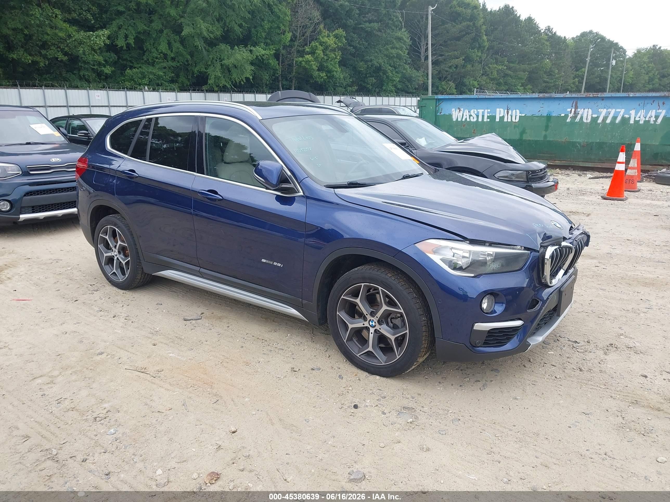 2018 BMW X1 sDrive28i, VIN WBXHU7C37J5H40600 — Front end
