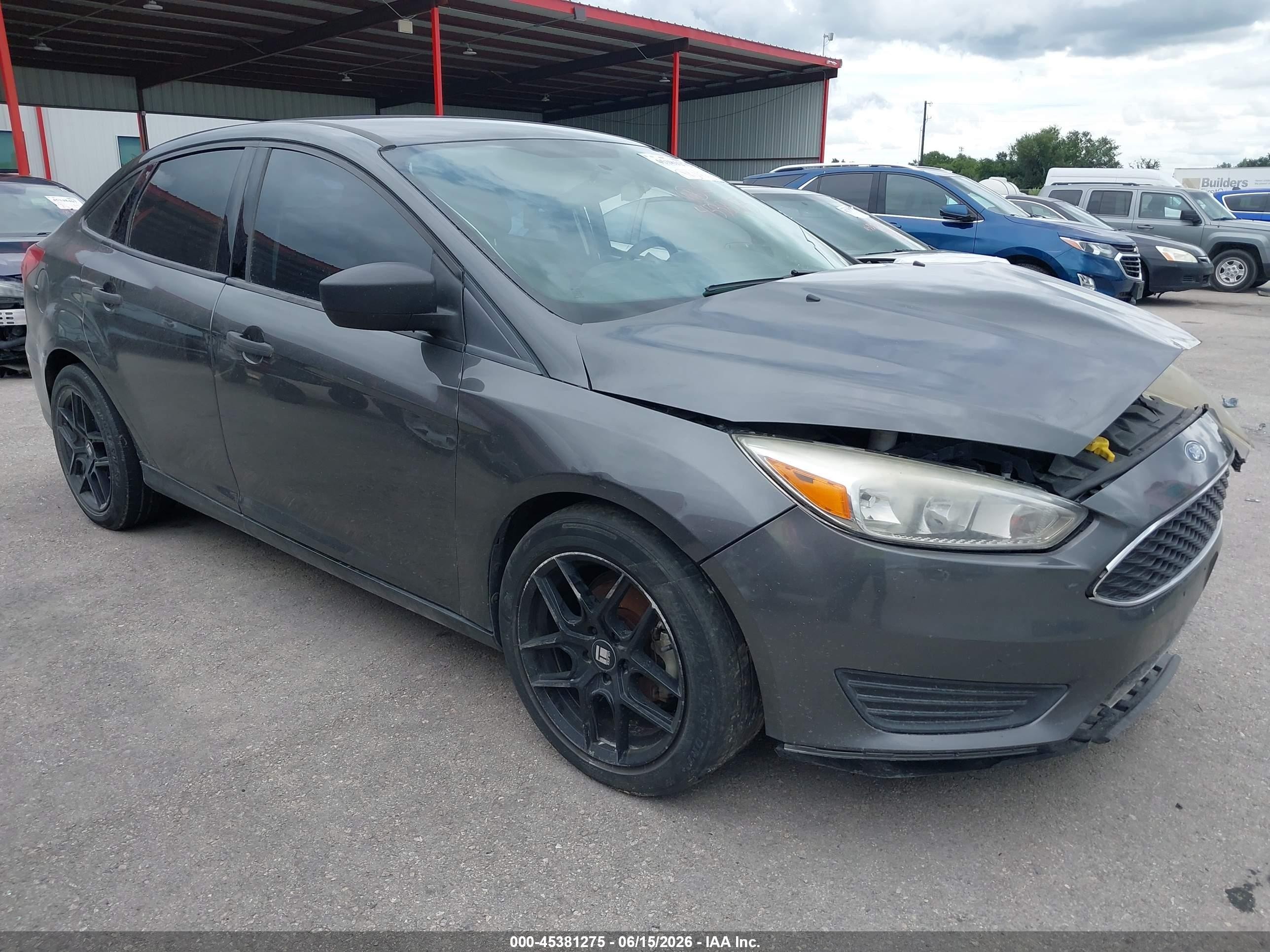 2017 Ford Focus S, VIN 1FADP3E23HL318641 — Side