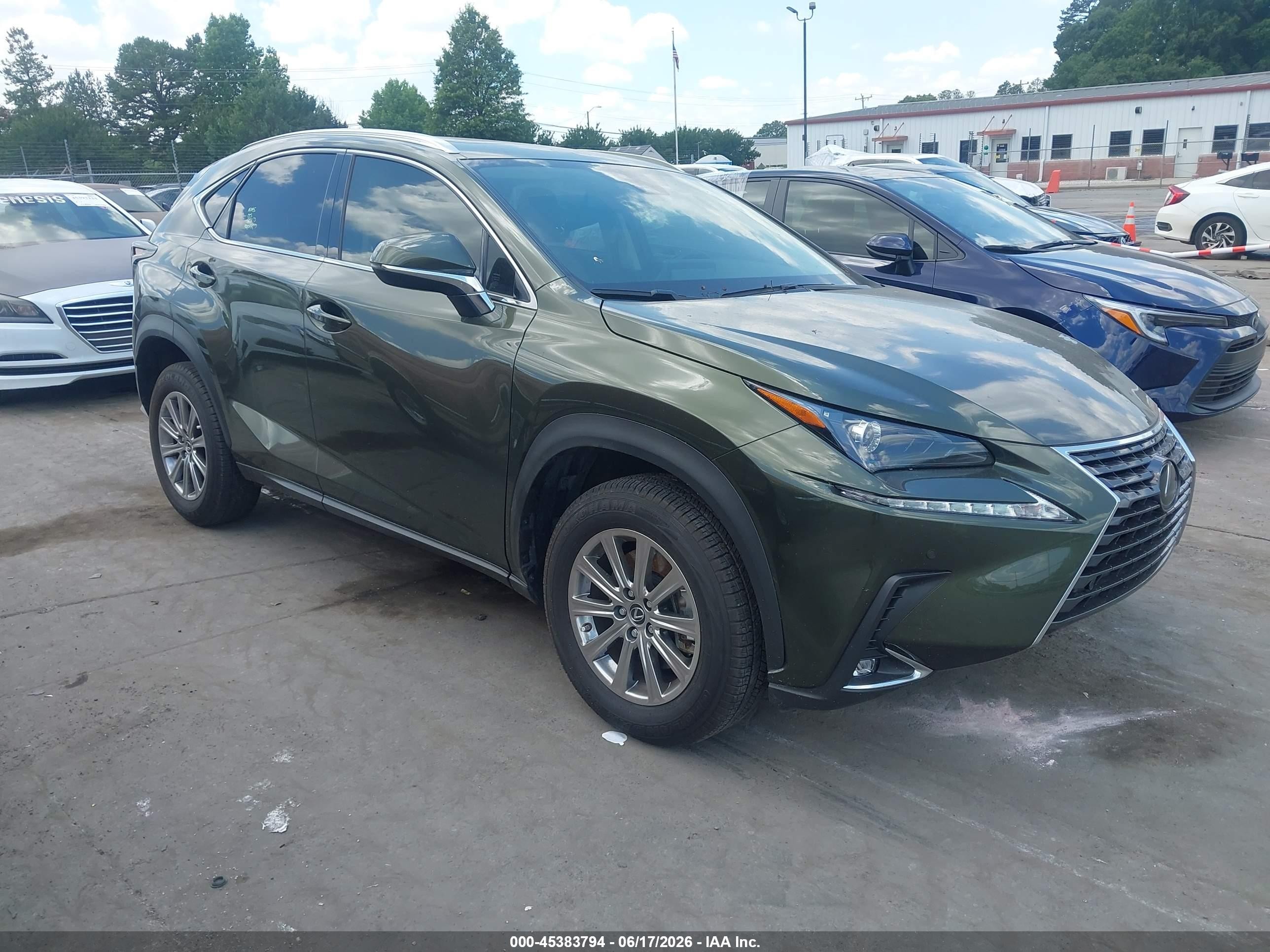 2021 Lexus NX 300, VIN JTJDARBZXM2191416 — Бок