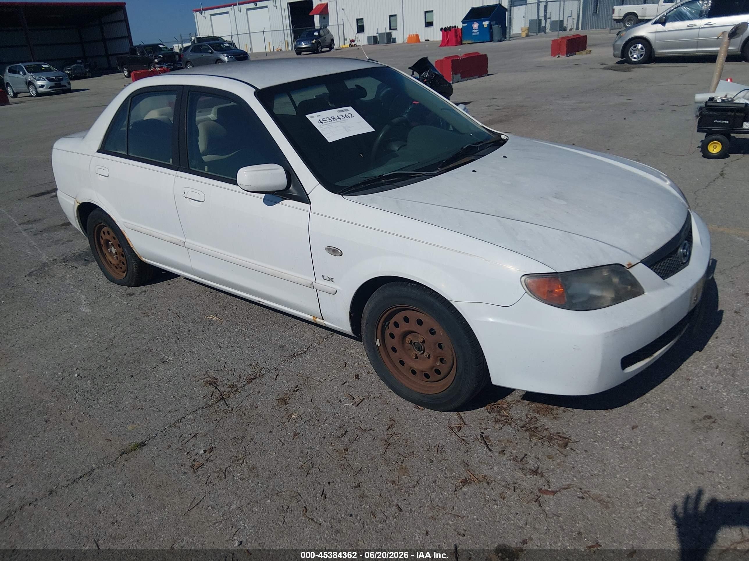 2002 Mazda Protege DX, VIN JM1BJ225221606813 — Normal wear