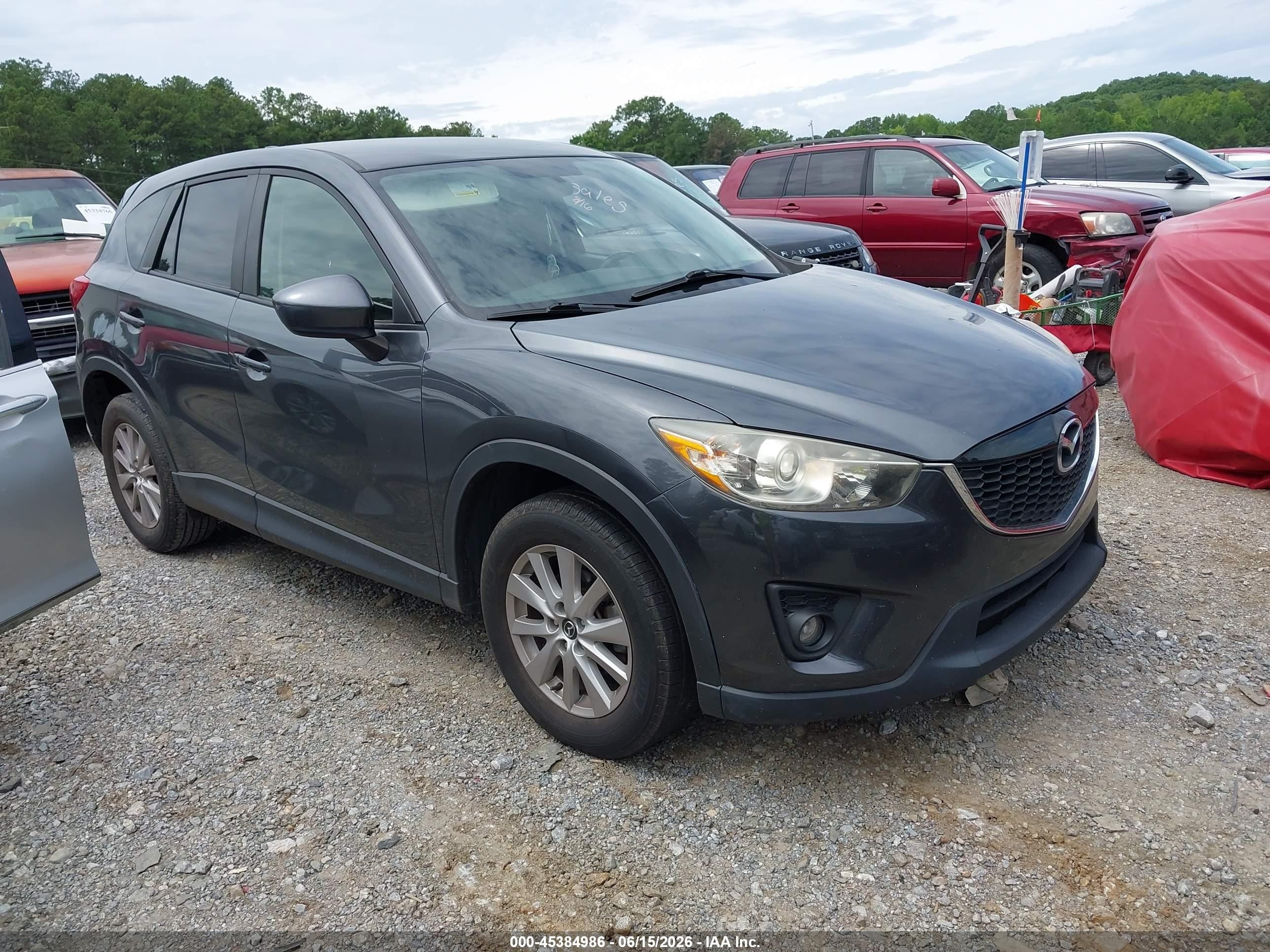 2015 Mazda CX-5 Touring, VIN JM3KE2CY8F0450647 — Зад