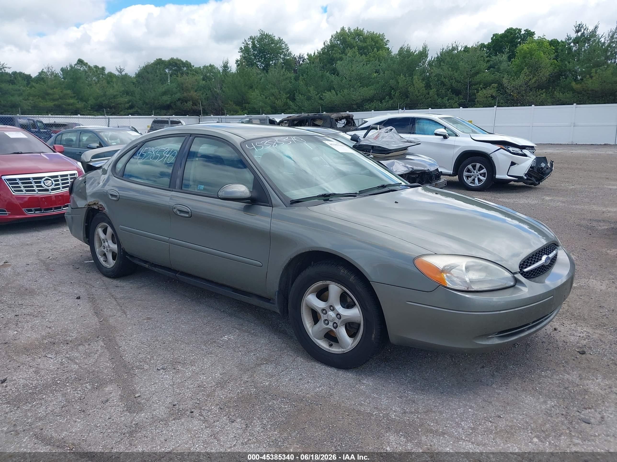 2001 Ford Taurus SE, VIN 1FAFP53U61G106579 — Зад