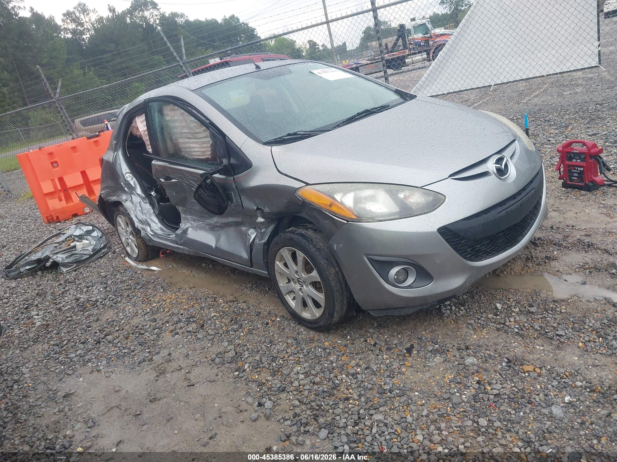 2013 Mazda 2 Touring, VIN JM1DE1LY3D0160728 — Side