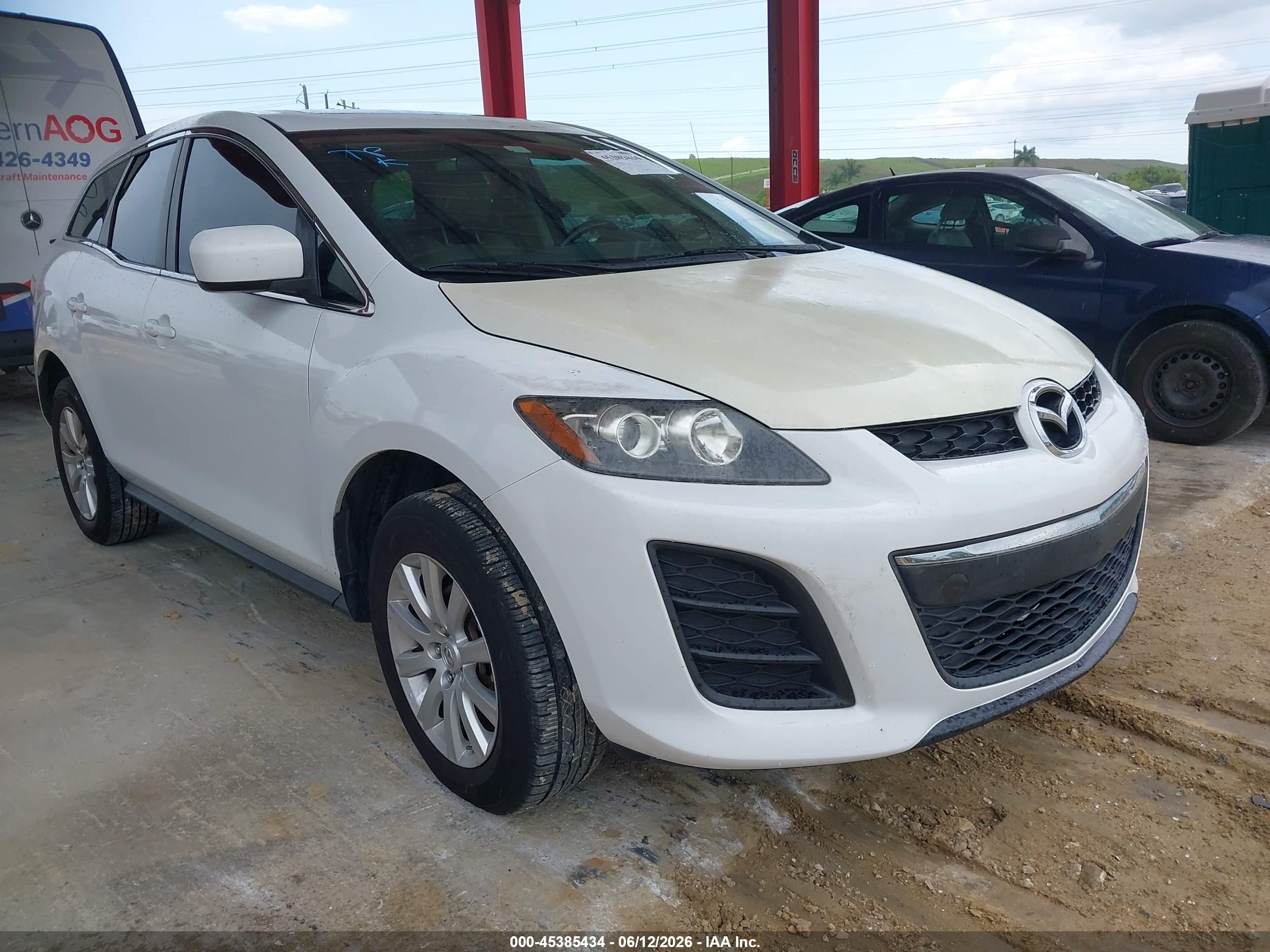 2011 Mazda CX-7 i Touring, VIN JM3ER2C58B0372582 — Not stated