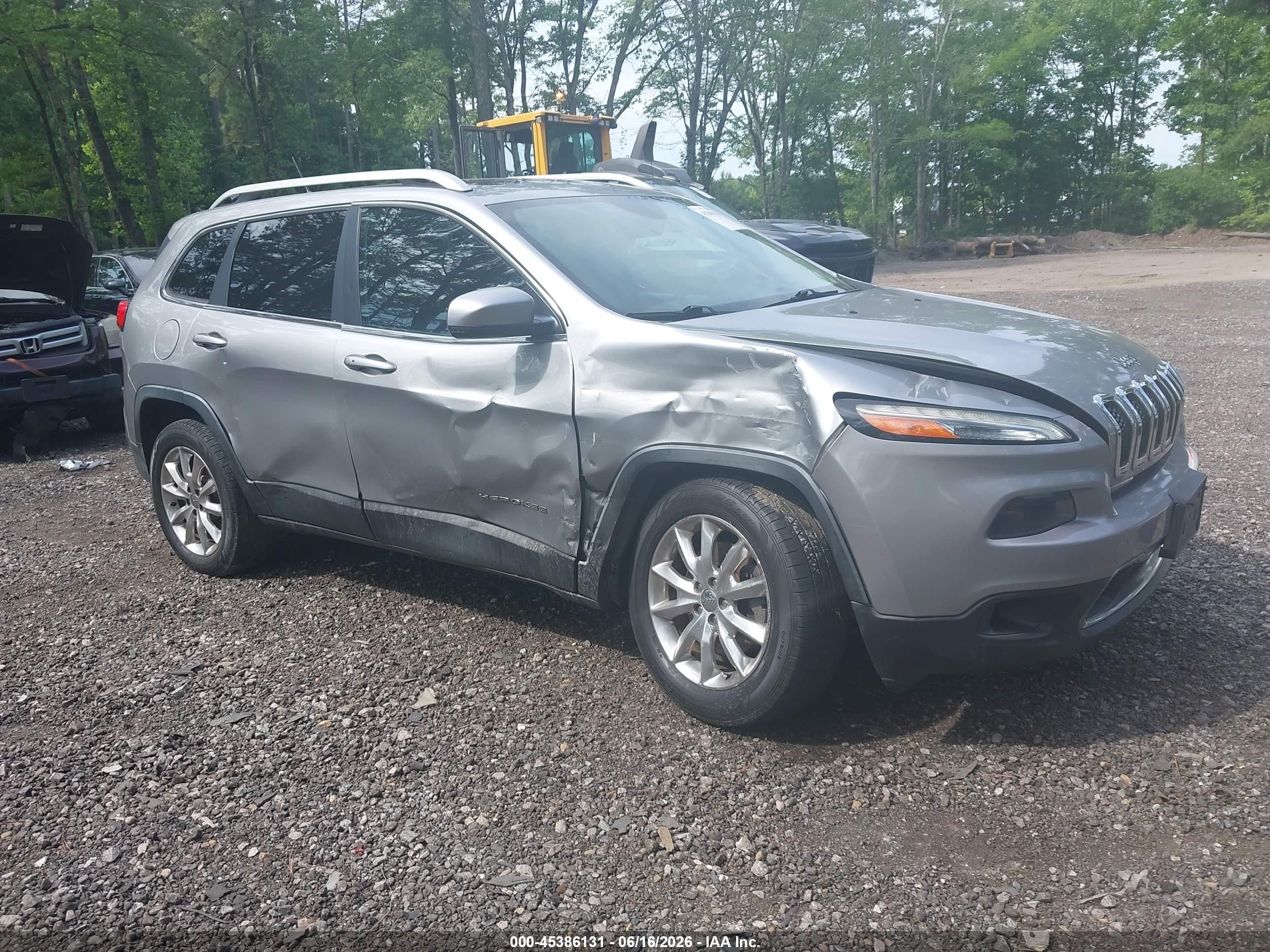 2015 Jeep Cherokee Limited, VIN 1C4PJMDS1FW545130 — Бок