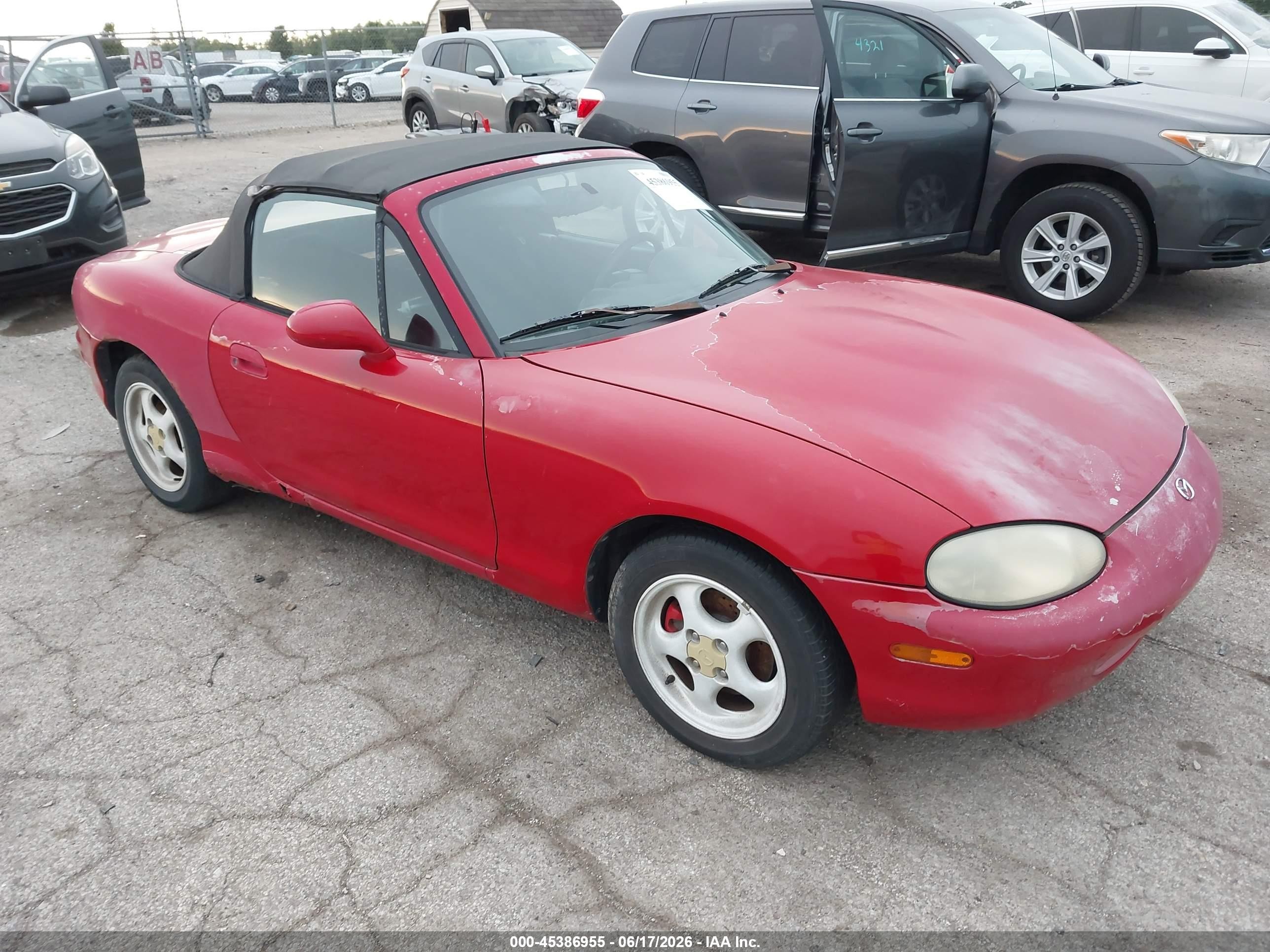 1999 Mazda MX-5 Miata, VIN JM1NB3537X0129691 — Normal wear