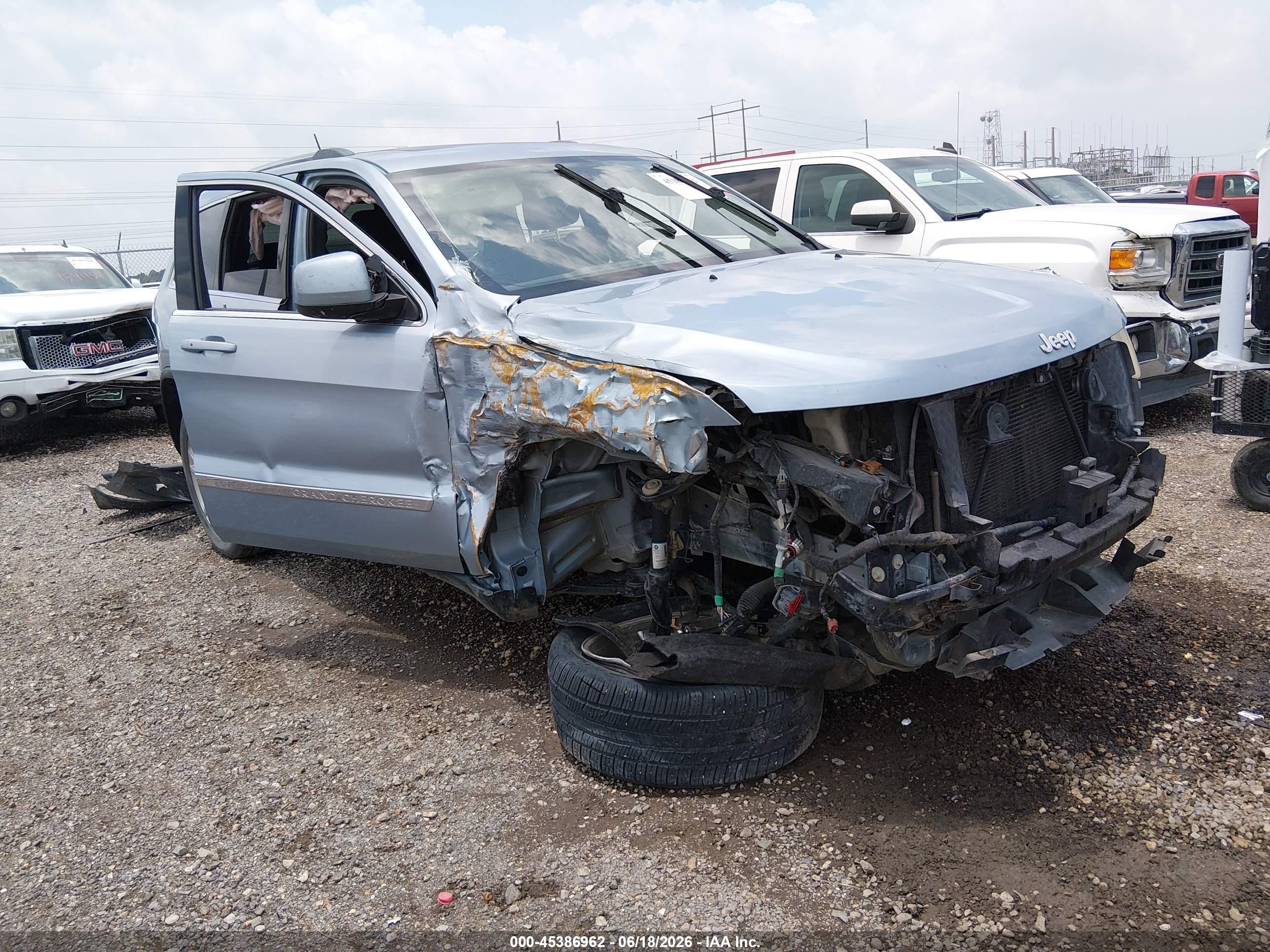 2013 Jeep Grand Cherokee Laredo, VIN 1C4RJEAG3DC550133 — Side