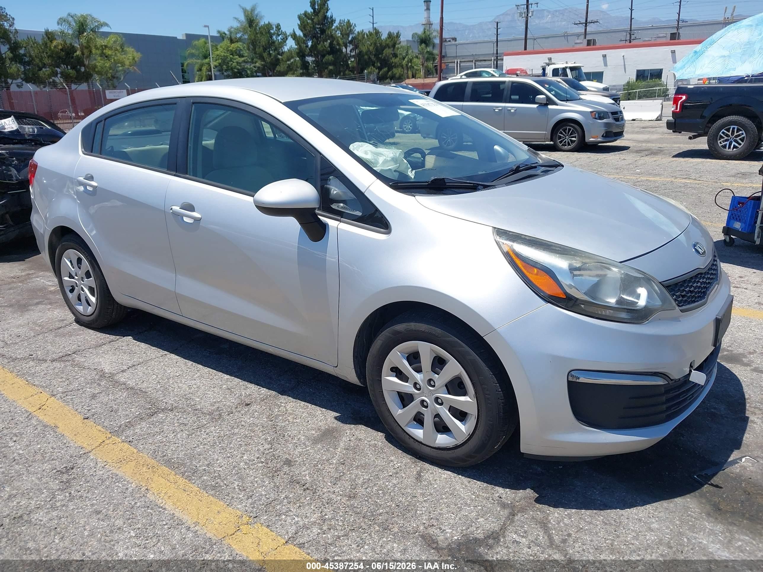2016 Kia Rio LX, VIN KNADM4A35G6623284 — Side