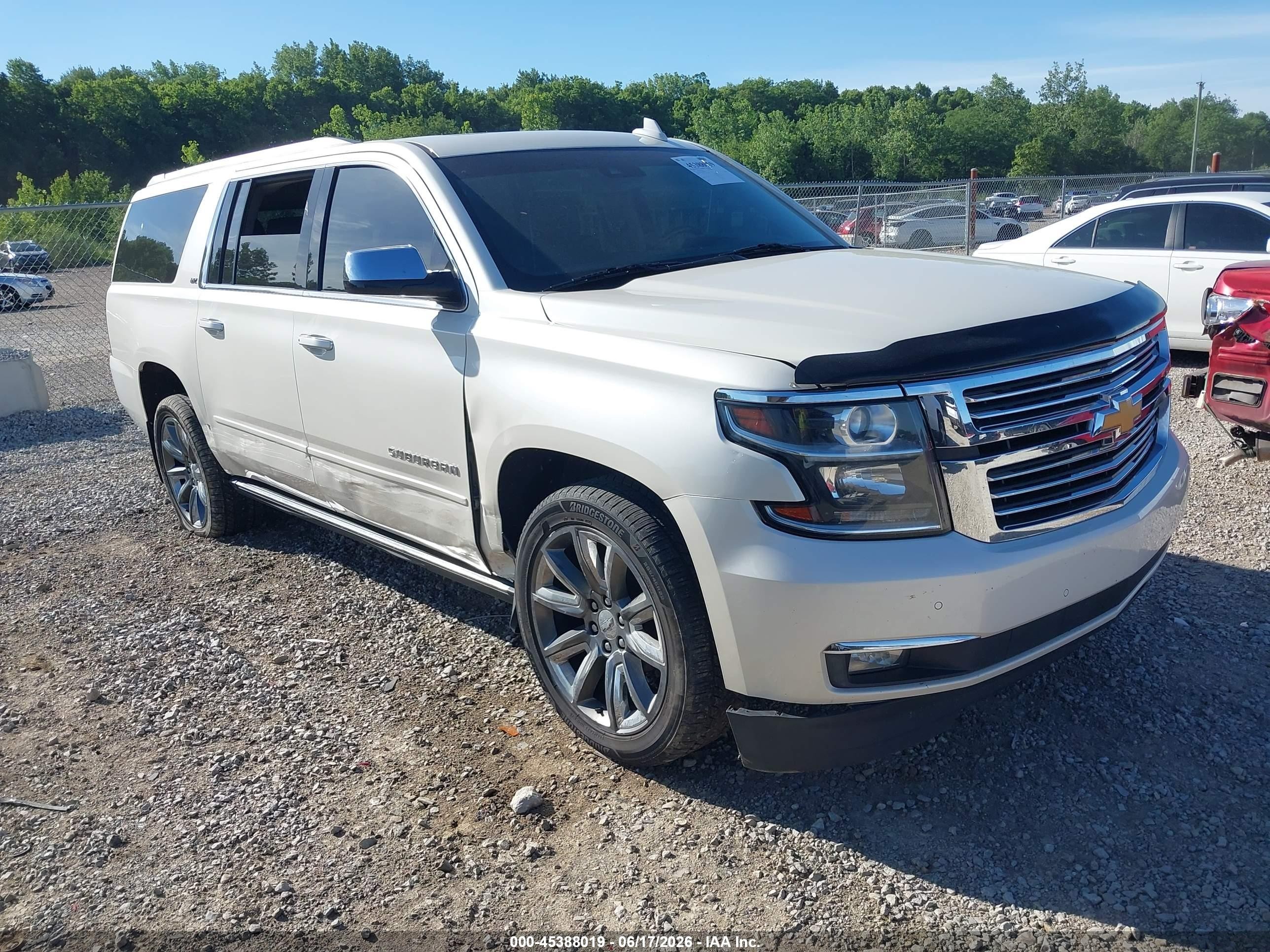 2015 Chevrolet Suburban LTZ, VIN 1GNSKKKCXFR684914 — Side
