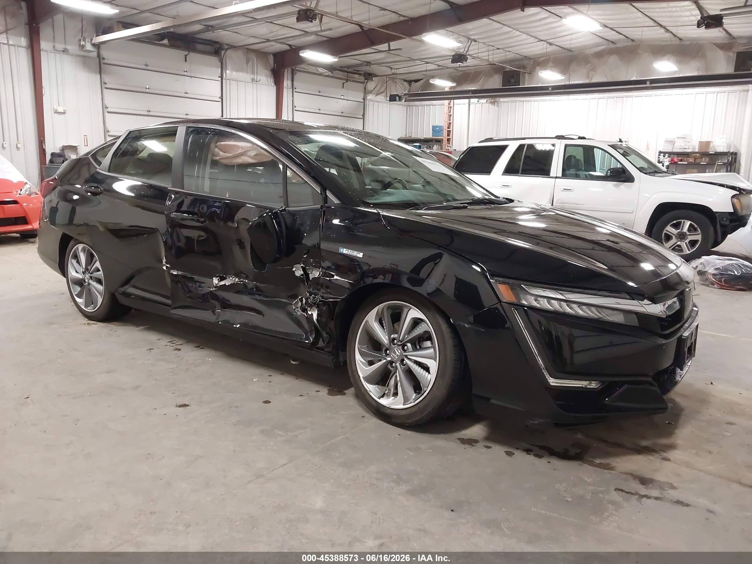 2021 Honda Clarity Touring, VIN JHMZC5F30MC002038 — Side