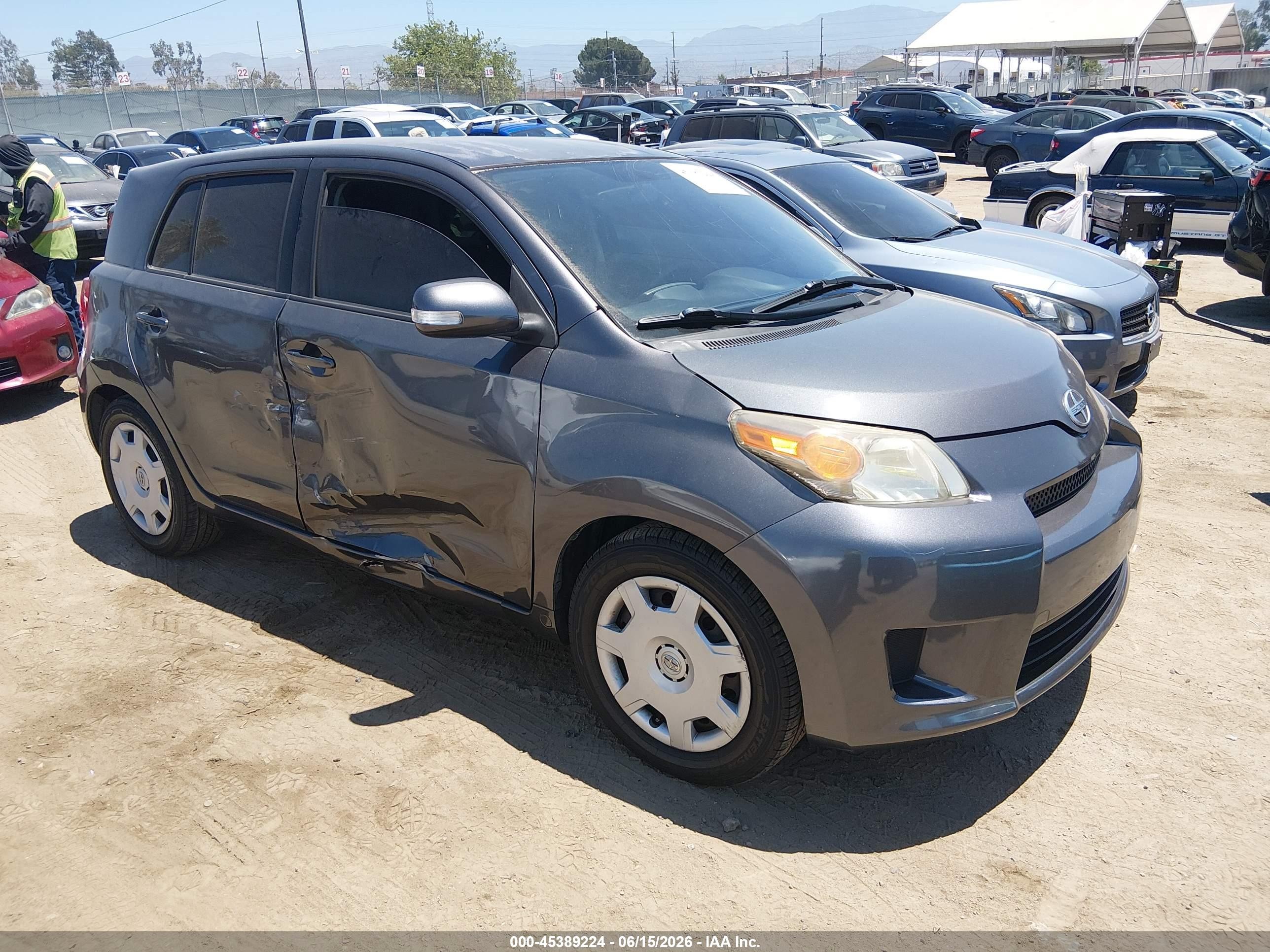 2013 Scion xD, VIN JTKKUPB47D1039070 — Side