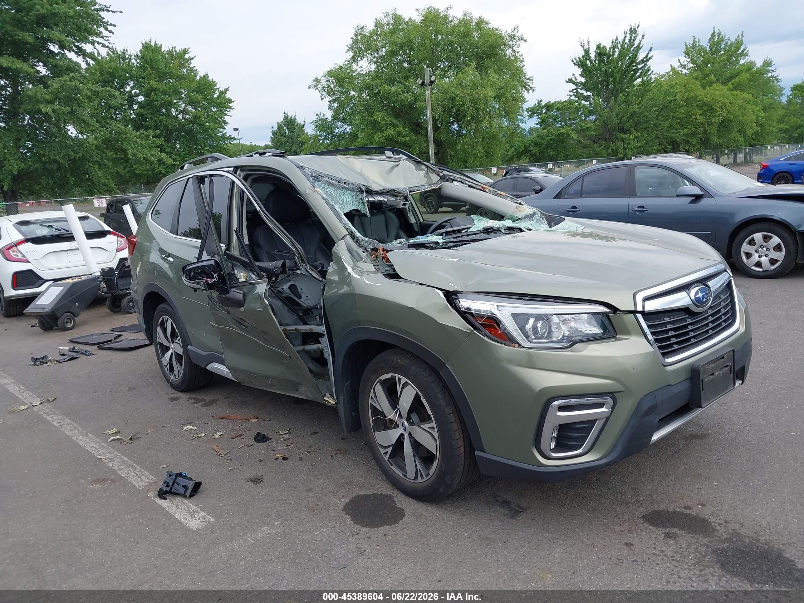 2019 Subaru Forester Touring, VIN JF2SKAWC0KH563100 — Storm