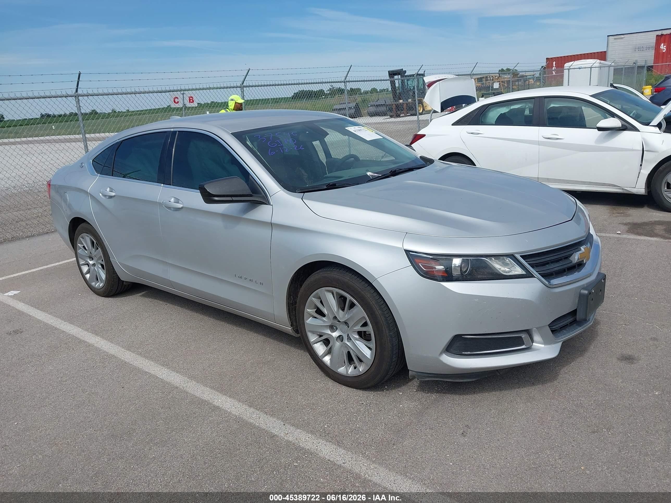 2015 Chevrolet Impala LS, VIN 1G11Z5SLXFU116752 — Side