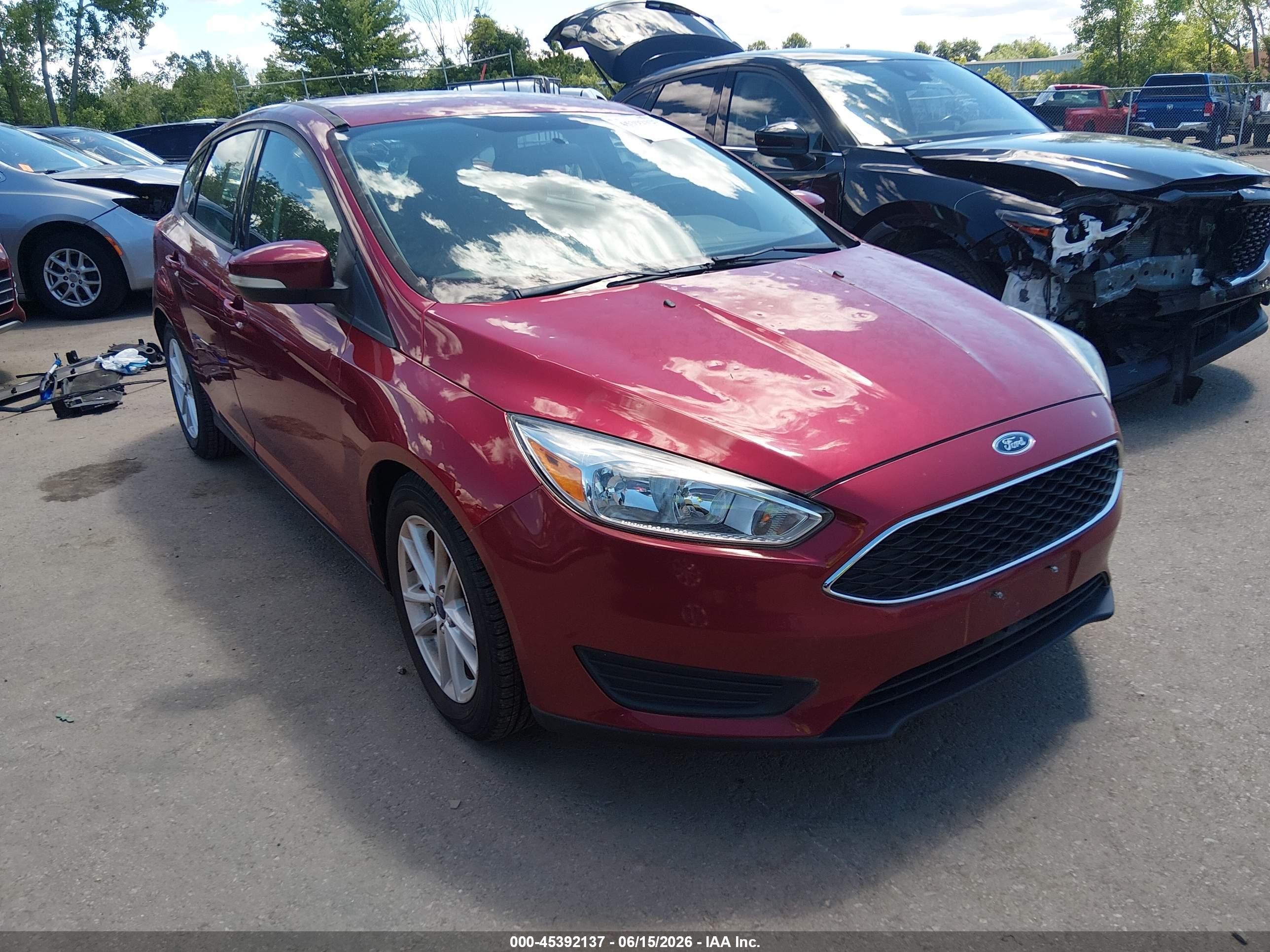 2016 Ford Focus SE, VIN 1FADP3K24GL213366 — Hail
