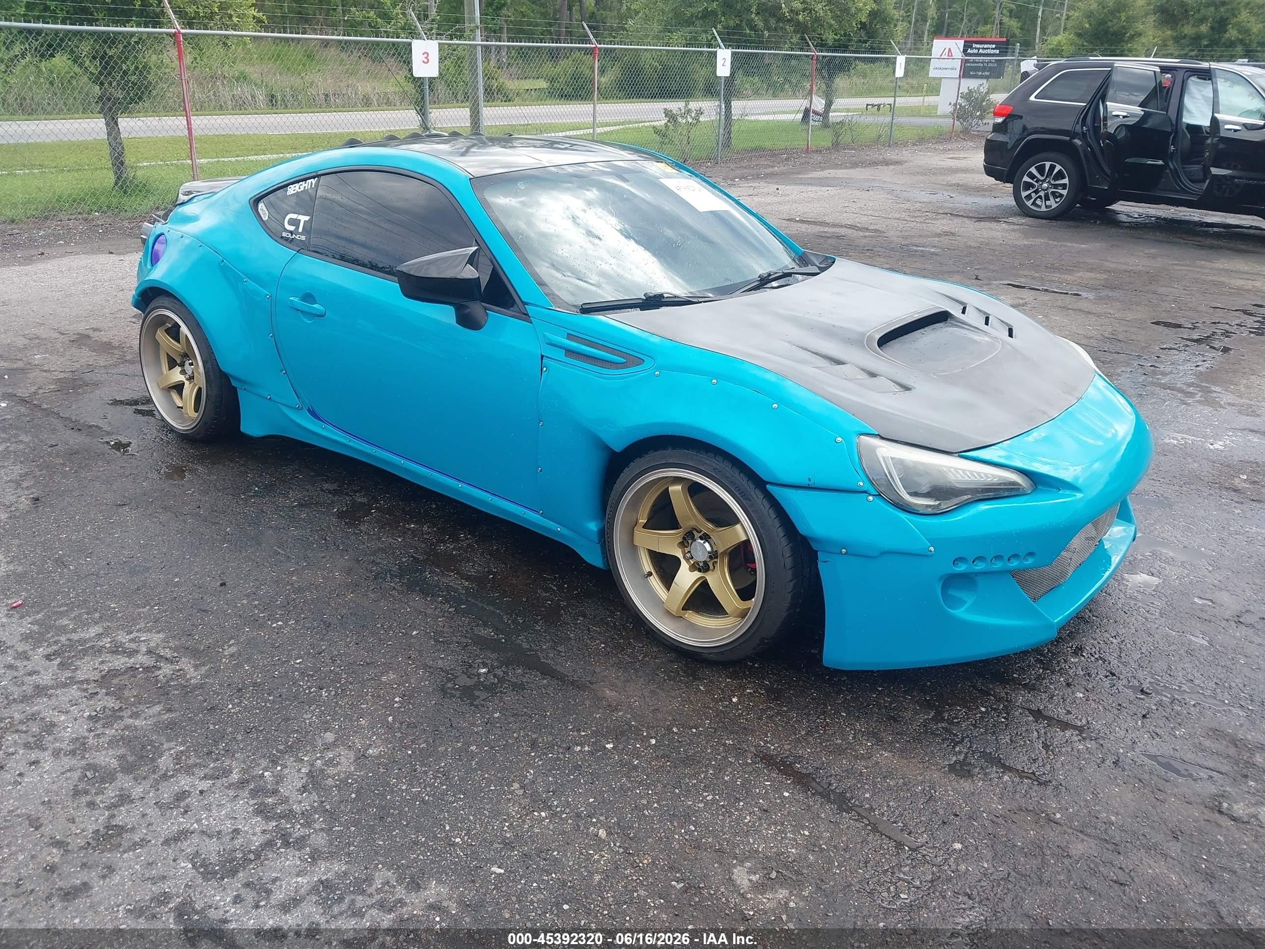 2014 Subaru BRZ Limited, VIN JF1ZCAC17E9603030 — Side