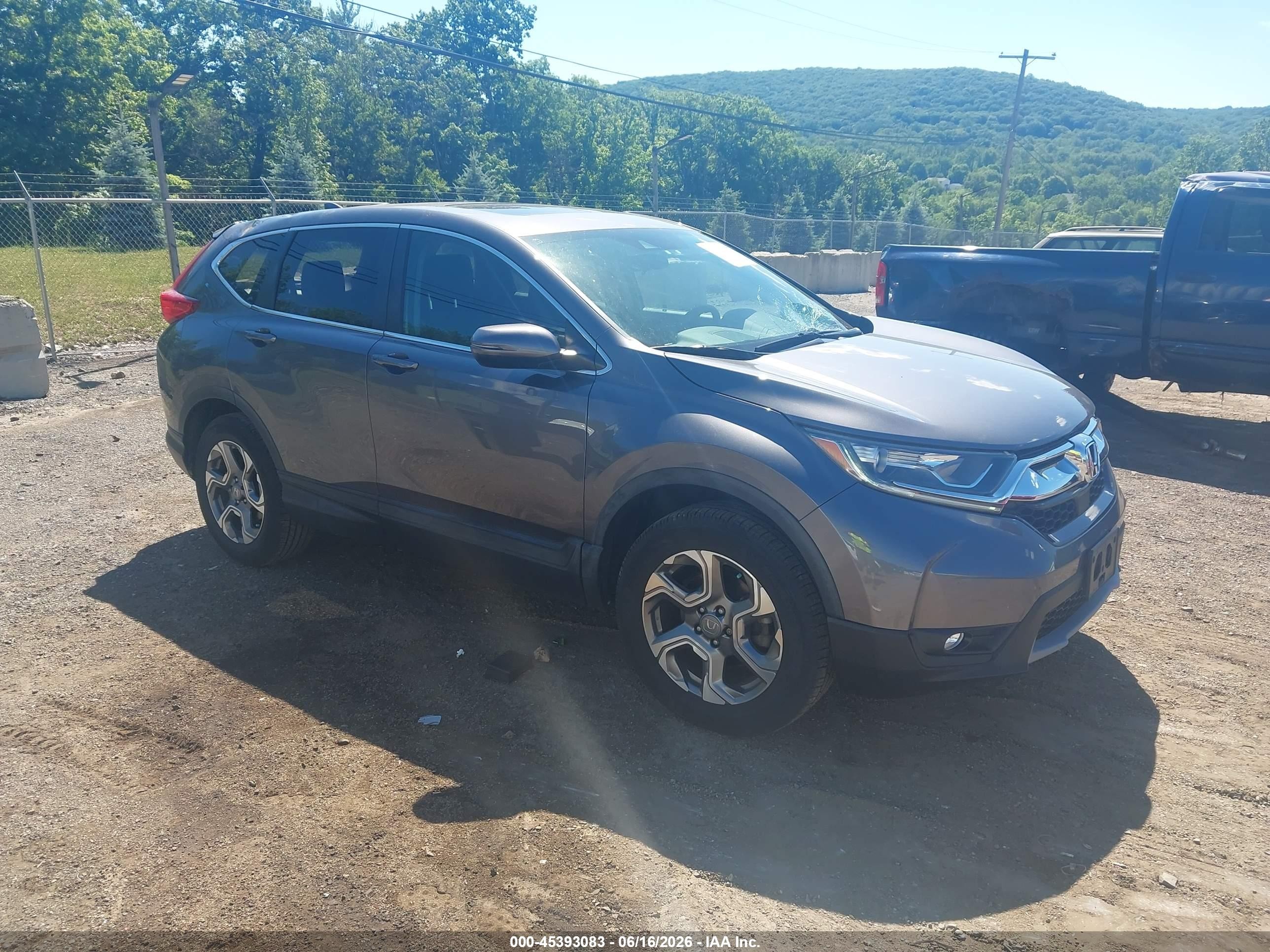 2018 Honda CR-V EX, VIN 2HKRW2H55JH602401 — Storm