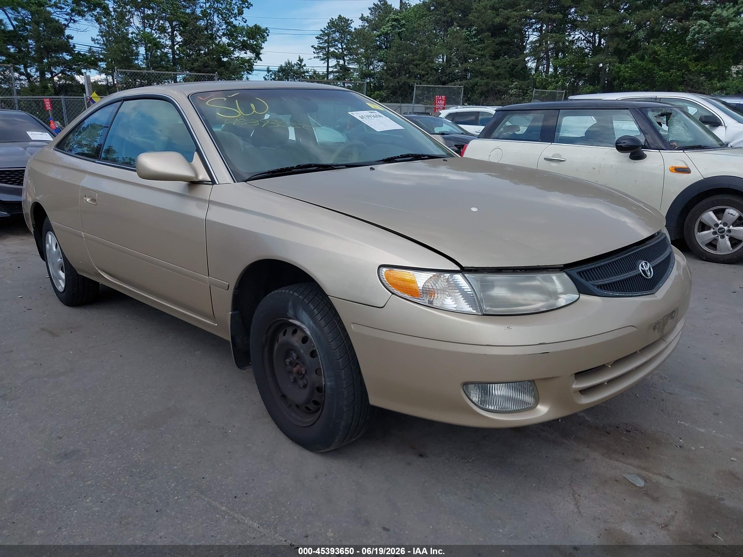 2000 Toyota Solara SE, VIN 2T1CG22P9YC285555 — Side