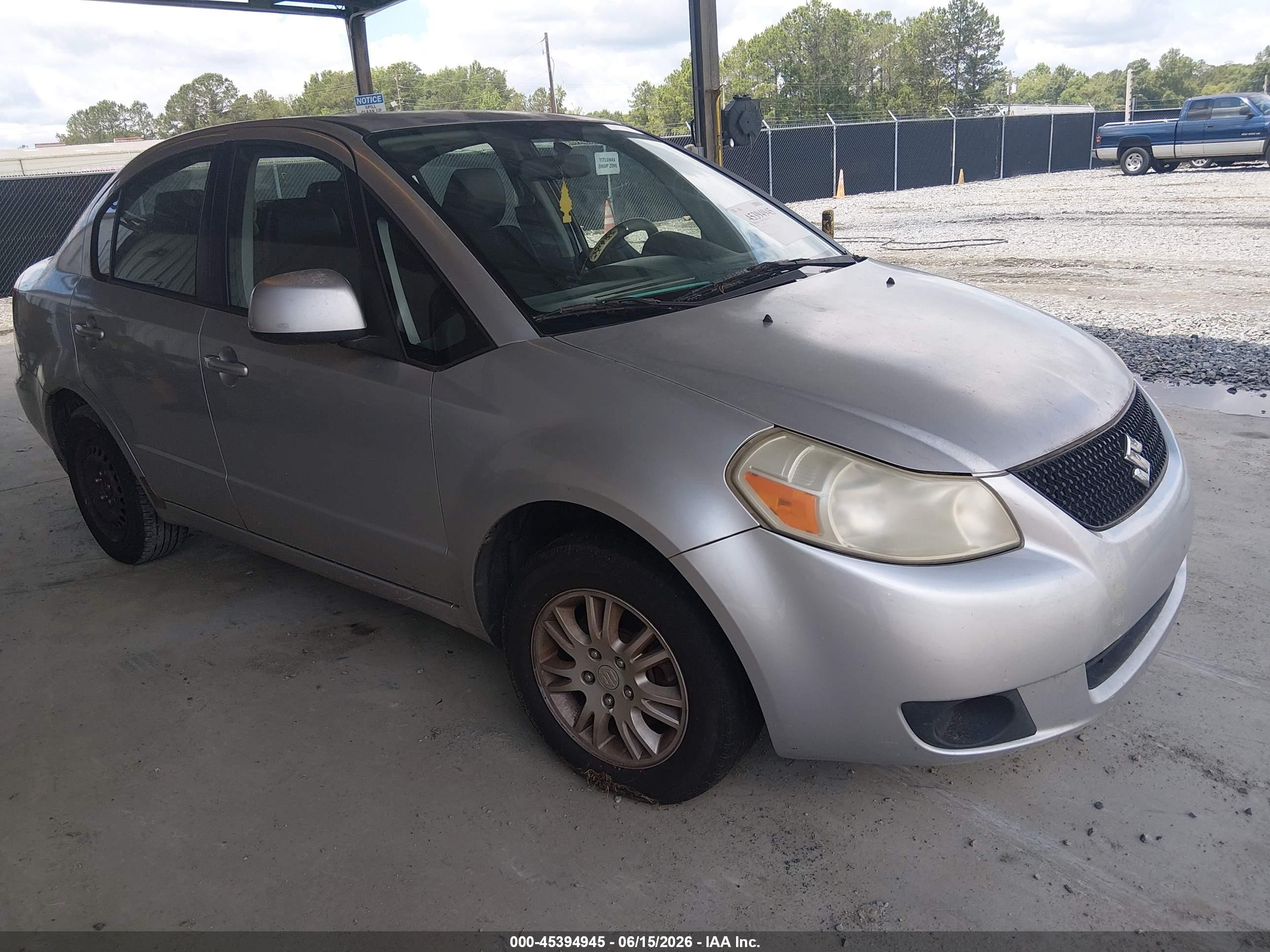 2012 Suzuki SX4 LE, VIN JS2YC5A34C6305590 — Rear end