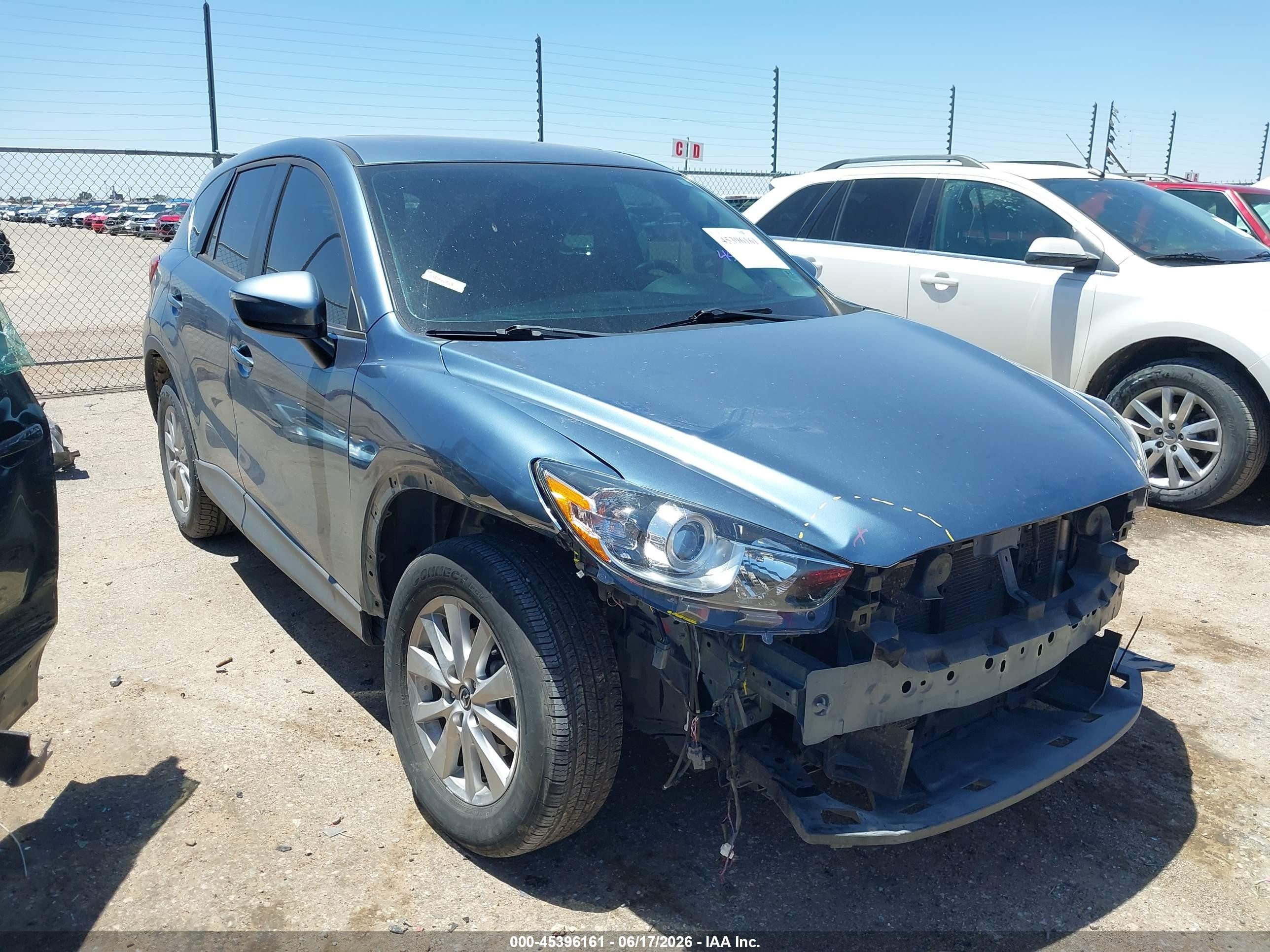 2016 Mazda CX-5 Touring, VIN JM3KE2CY9G0799205 — Front end