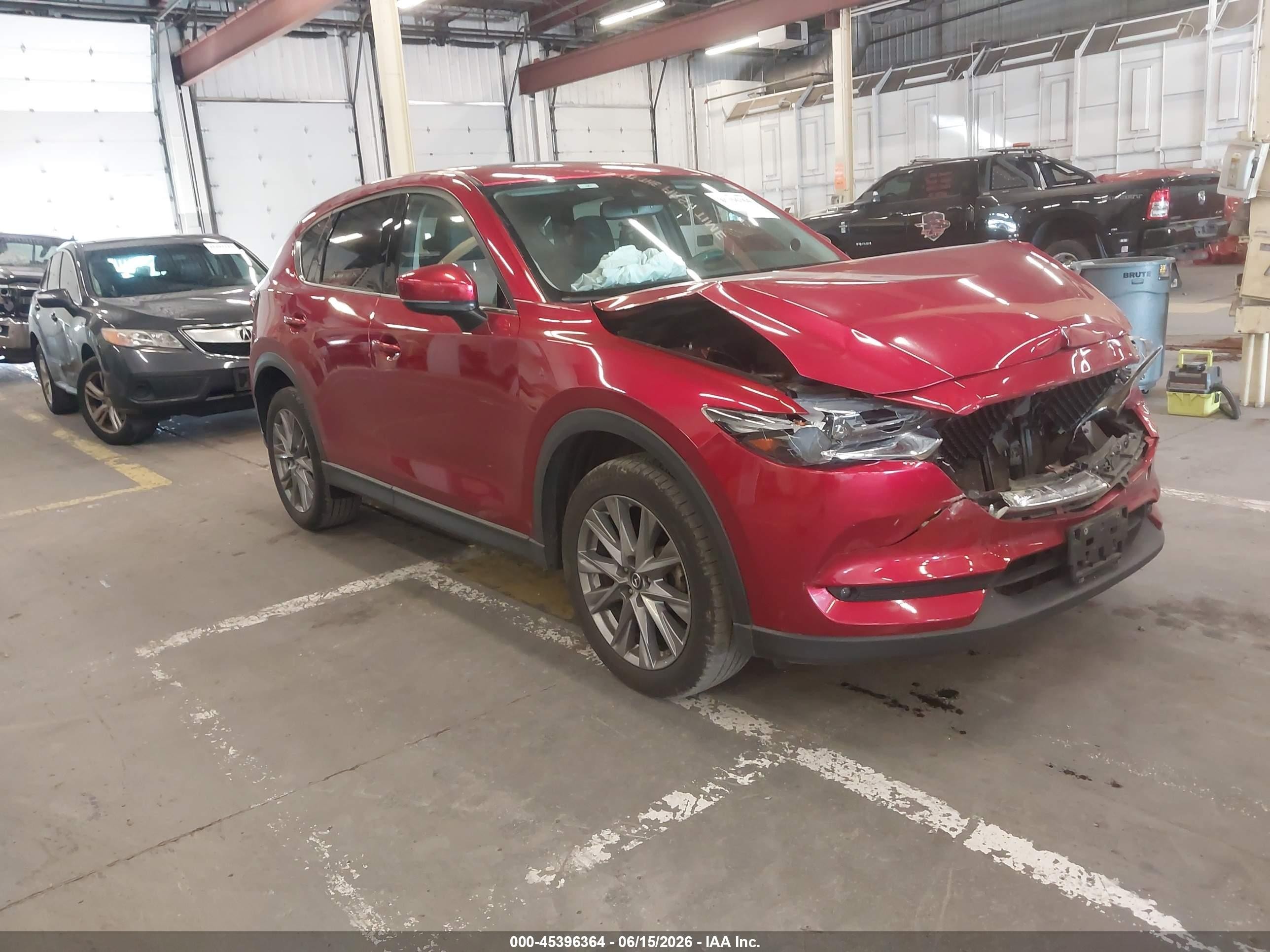 2020 Mazda CX-5 Grand Touring, VIN JM3KFBDM4L1810057 — Front end