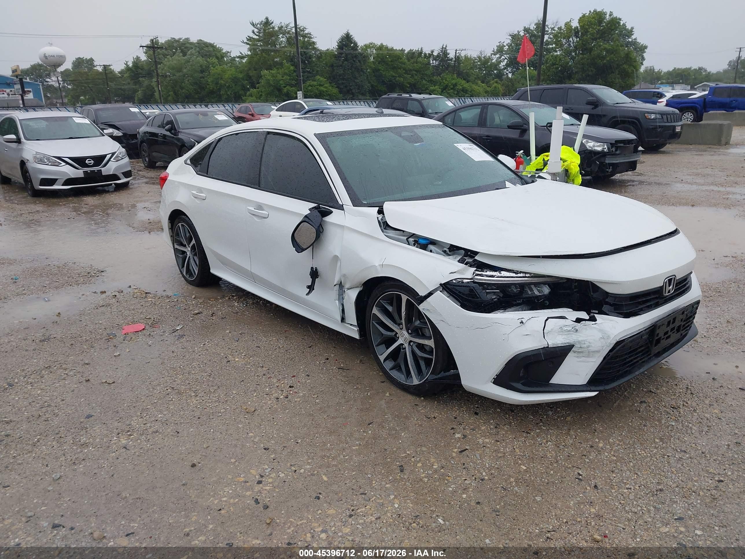 2024 Honda Civic Touring, VIN 2HGFE1F90RH303829 — Front end