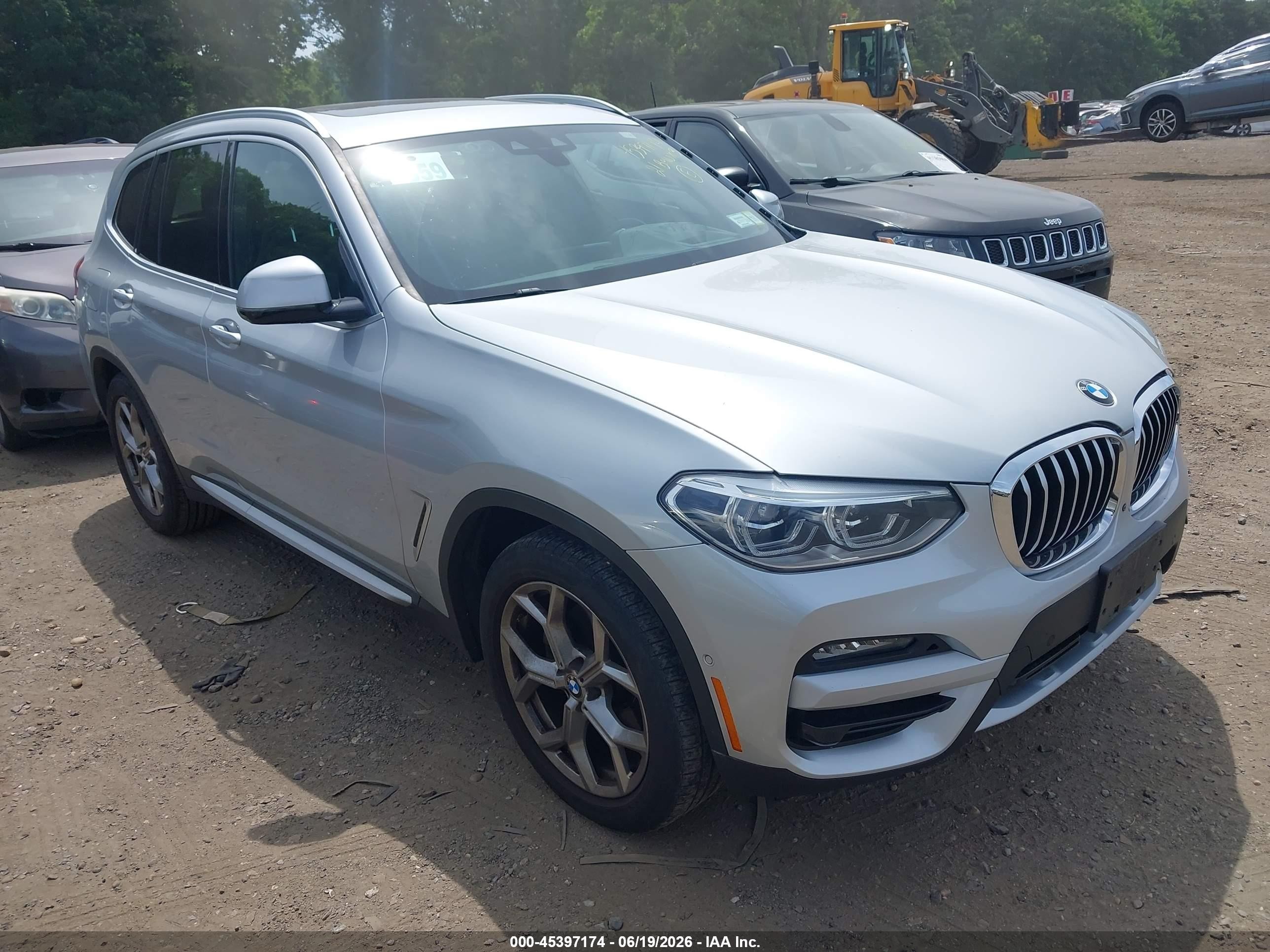 2021 BMW X3 xDrive30i, VIN 5UXTY5C02M9G54256 — Side