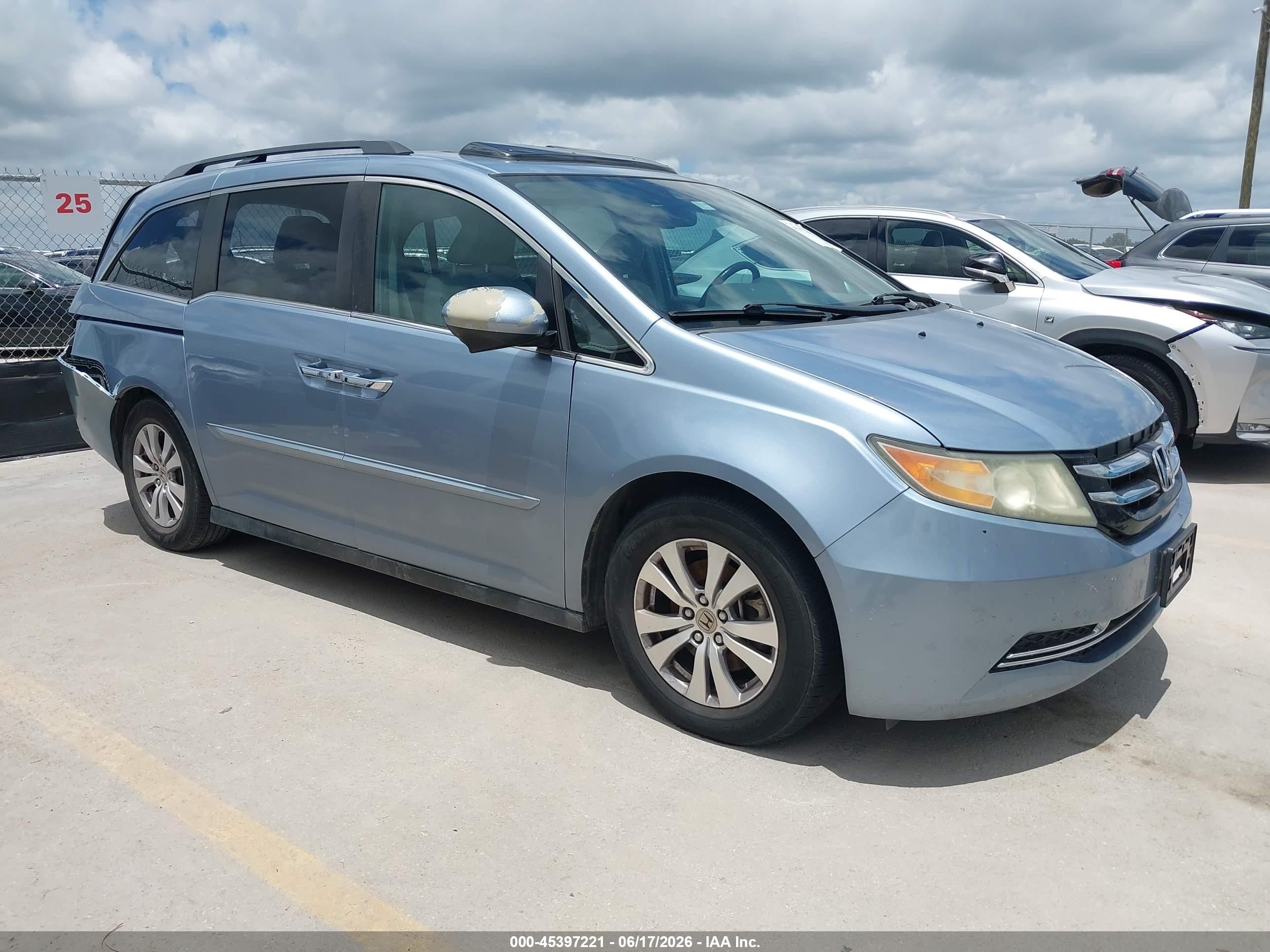 2014 Honda Odyssey EX-L, VIN 5FNRL5H64EB091884 — Rear end