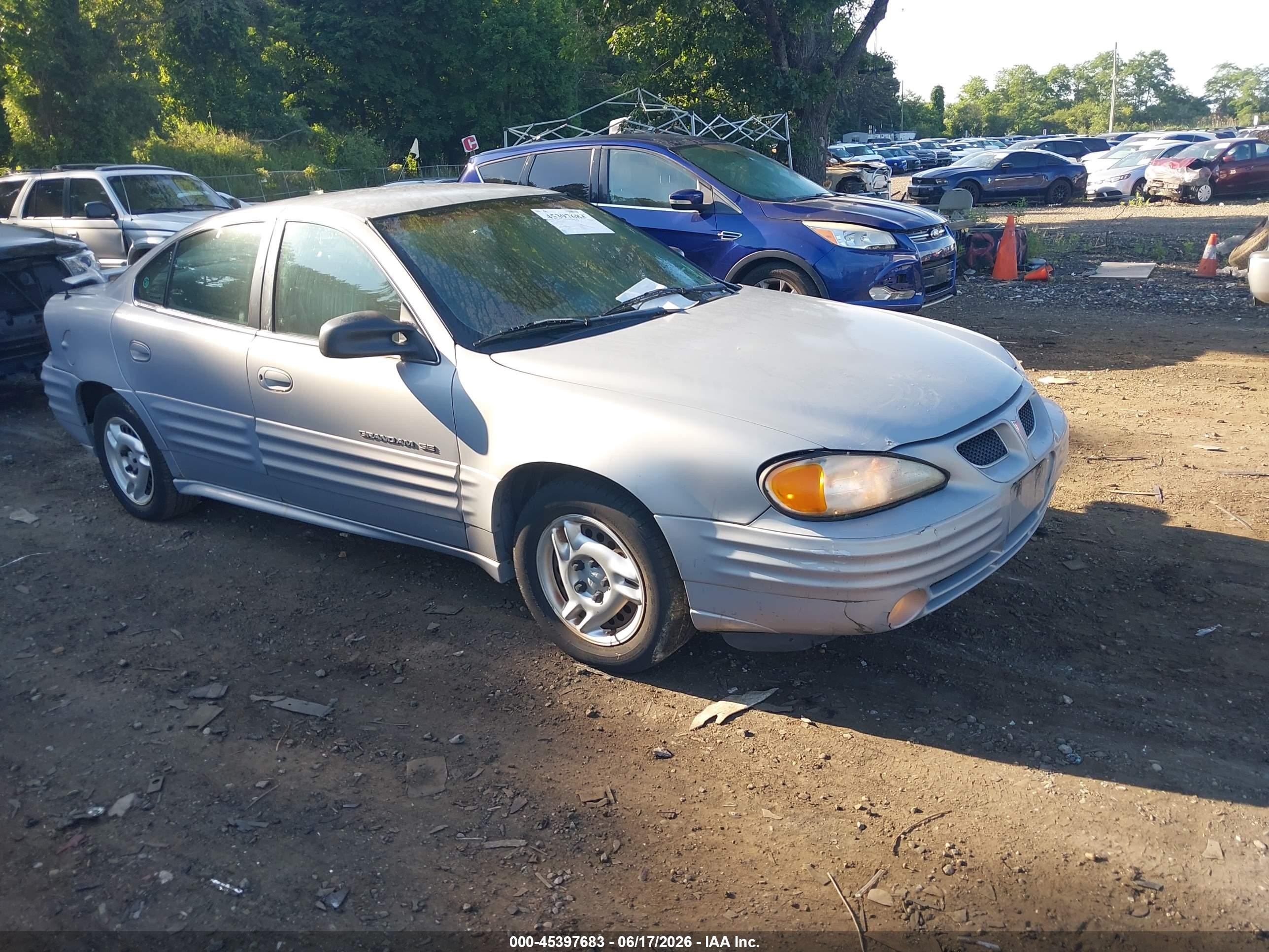 2000 Pontiac Grand Am SE1, VIN 1G2NE52T2YM854721 — Normal wear