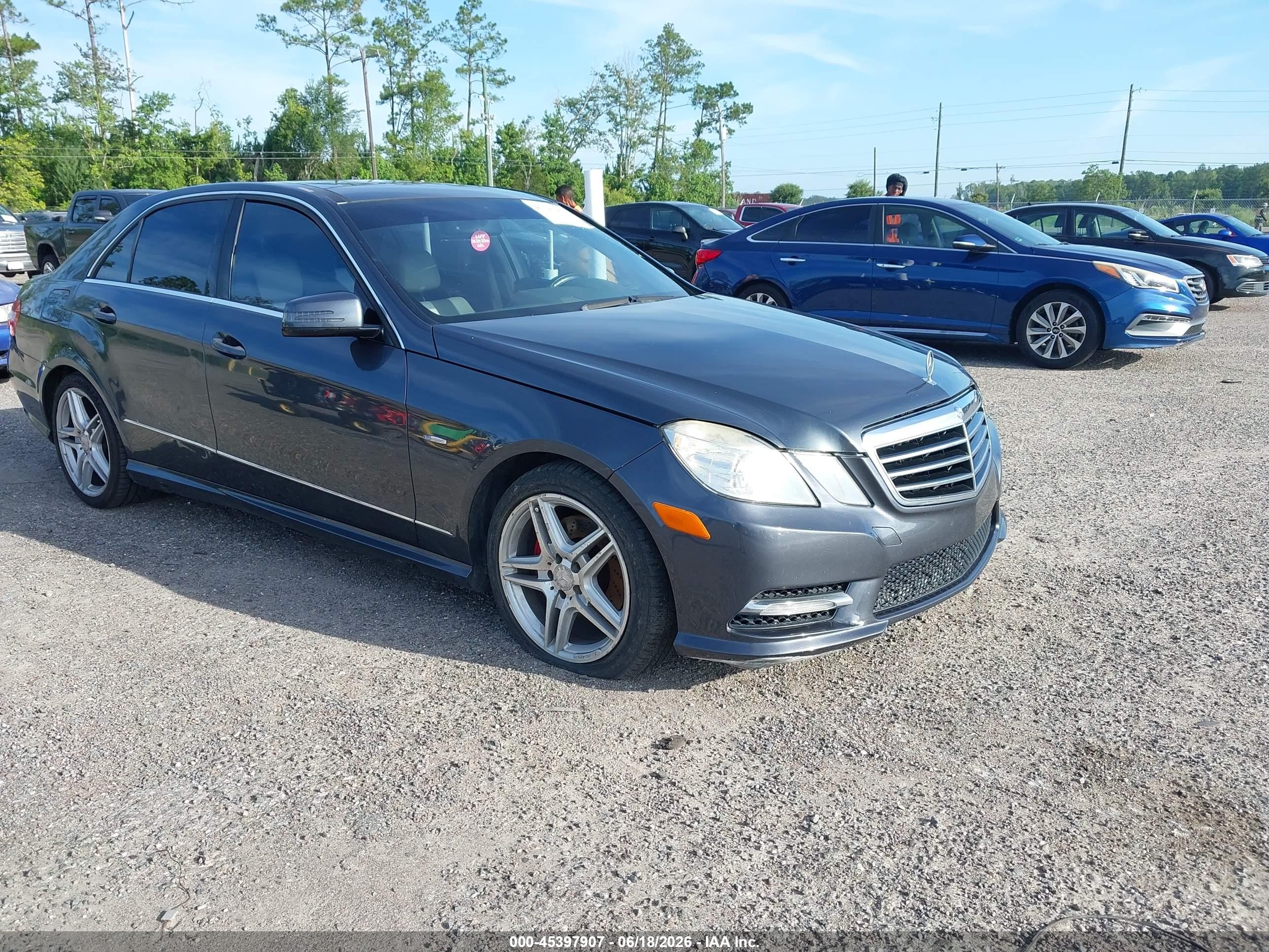 2012 Mercedes-Benz E 350 Sport, VIN WDDHF5KB1CA524274 — Rear end