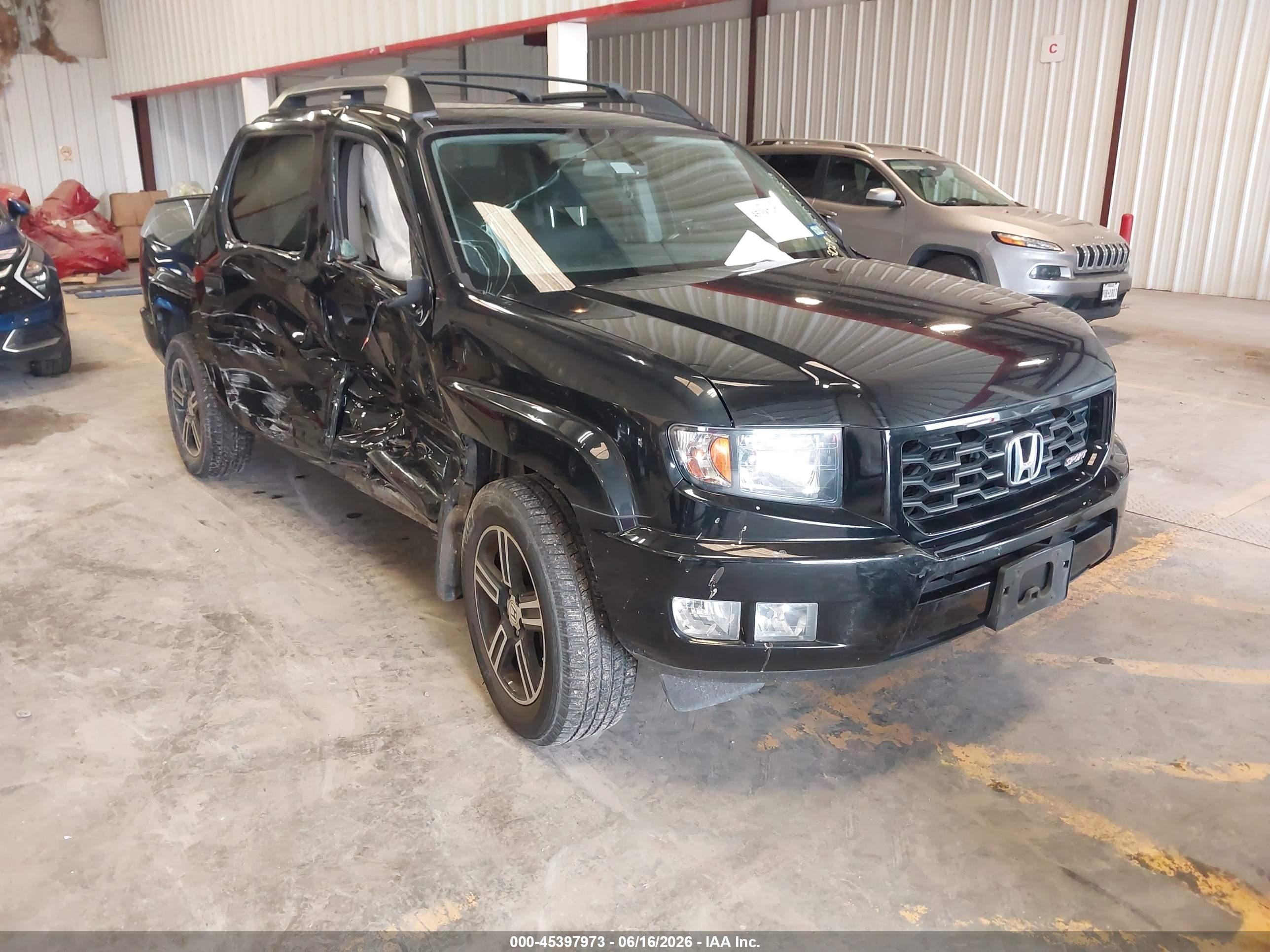 2014 Honda Ridgeline Sport, VIN 5FPYK1F75EB003029 — Side