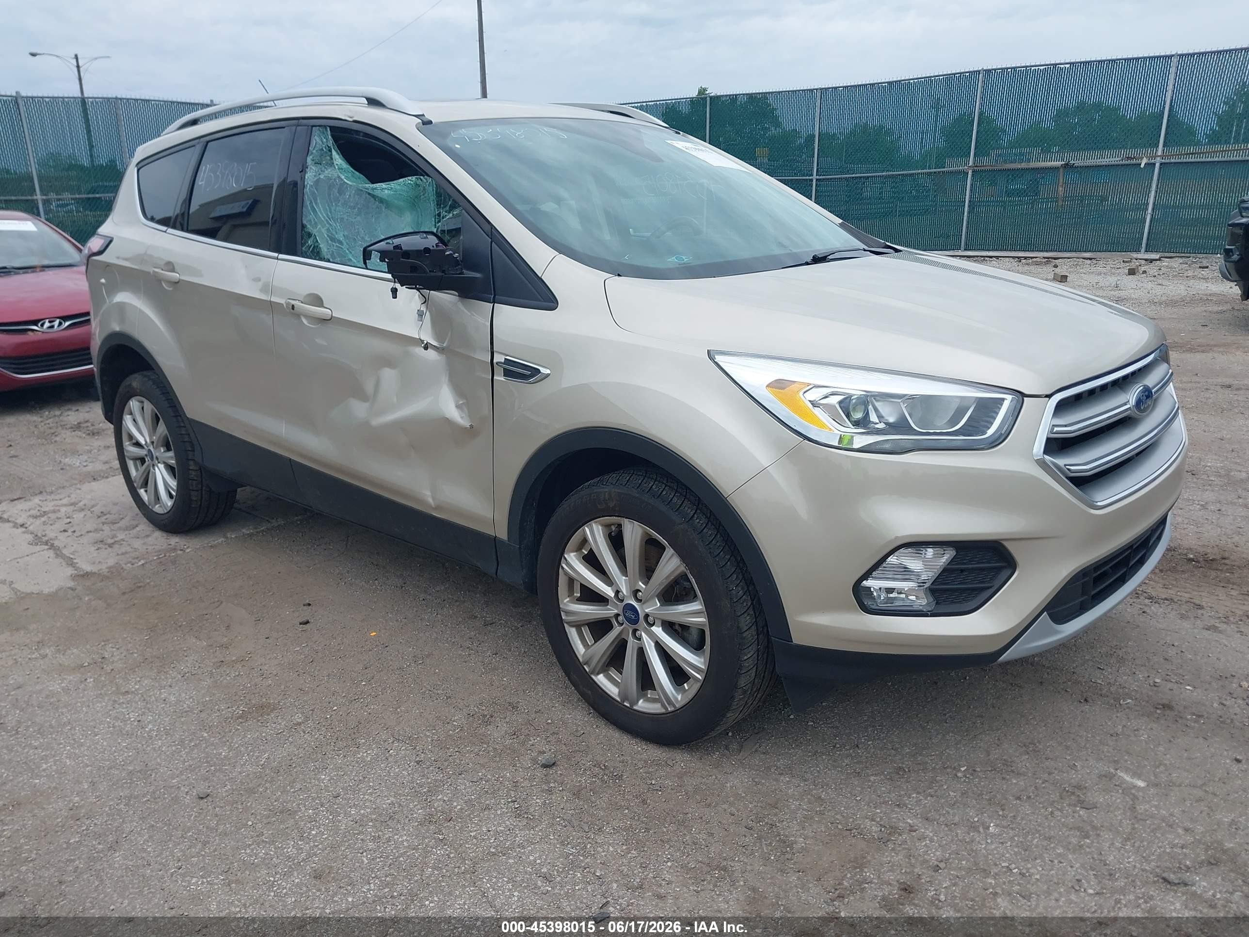 2017 Ford Escape Titanium, VIN 1FMCU9JD2HUE22567 — Storm
