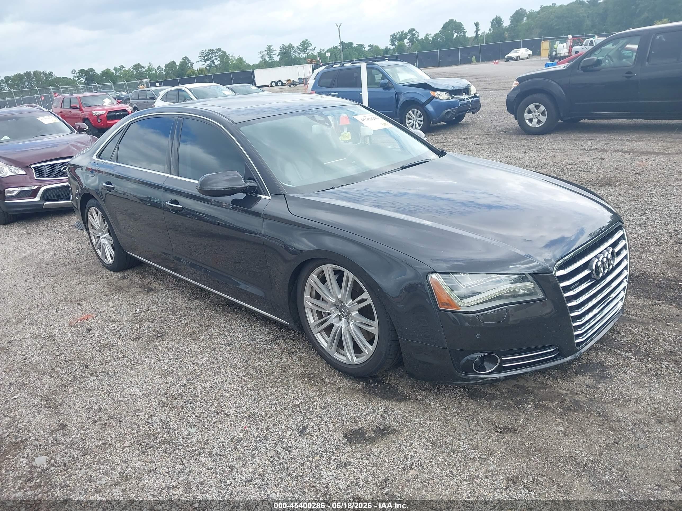 2011 Audi A8, VIN WAURVAFD3BN005205 — Side