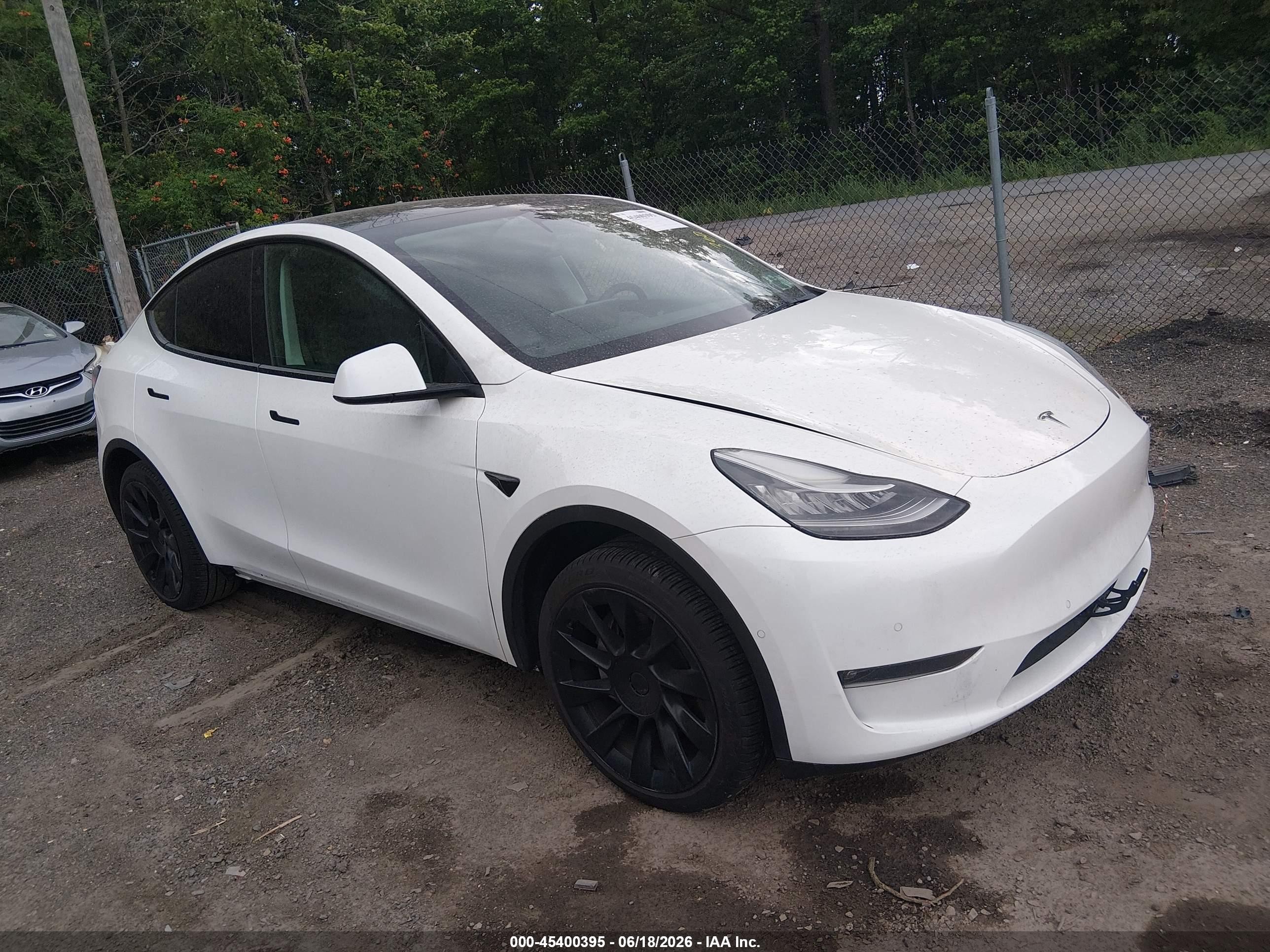 2021 Tesla Model Y Standard Range, VIN 5YJYGDED9MF192785 — Not stated