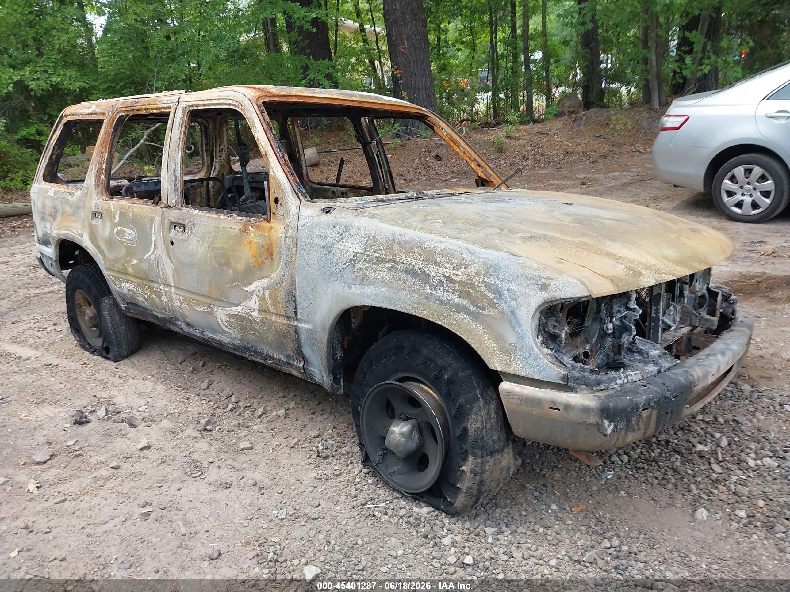 1997 Ford Explorer XL, VIN 1FMDU34X7VUD43950 — Burn