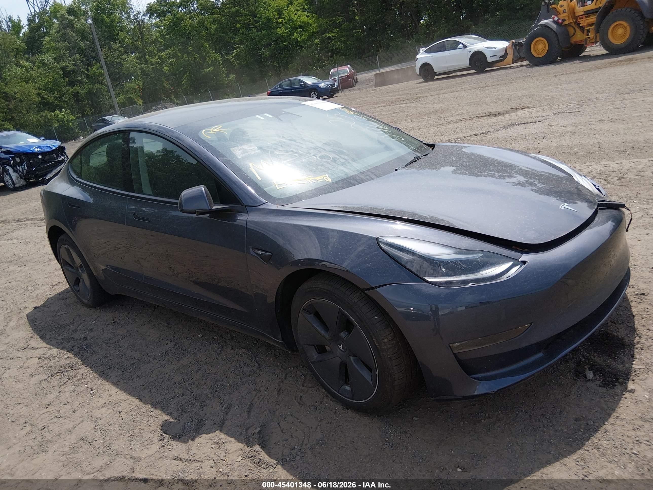 2023 Tesla Model 3 Long Range, VIN 5YJ3E1EB1PF634735 — Front end
