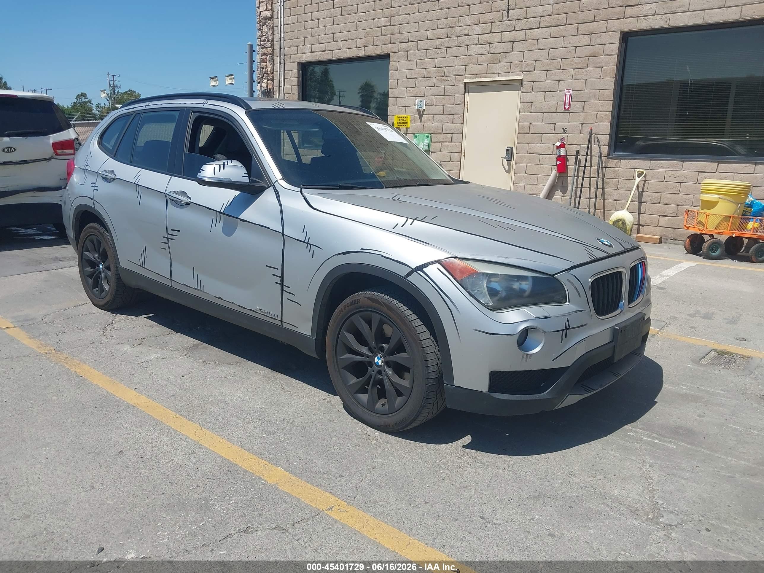 2013 BMW X1 xDrive28i, VIN WBAVL1C51DVR92083 — Undercarriage